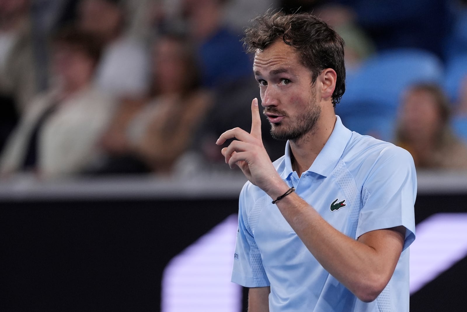 Daniil Medvedev of Russia gestures during his second round match against Learner Tien of the U.S. at the Australian Open tennis championship in Melbourne, Australia, Thursday, Jan. 16, 2025. (AP Photo/Ng Han Guan)