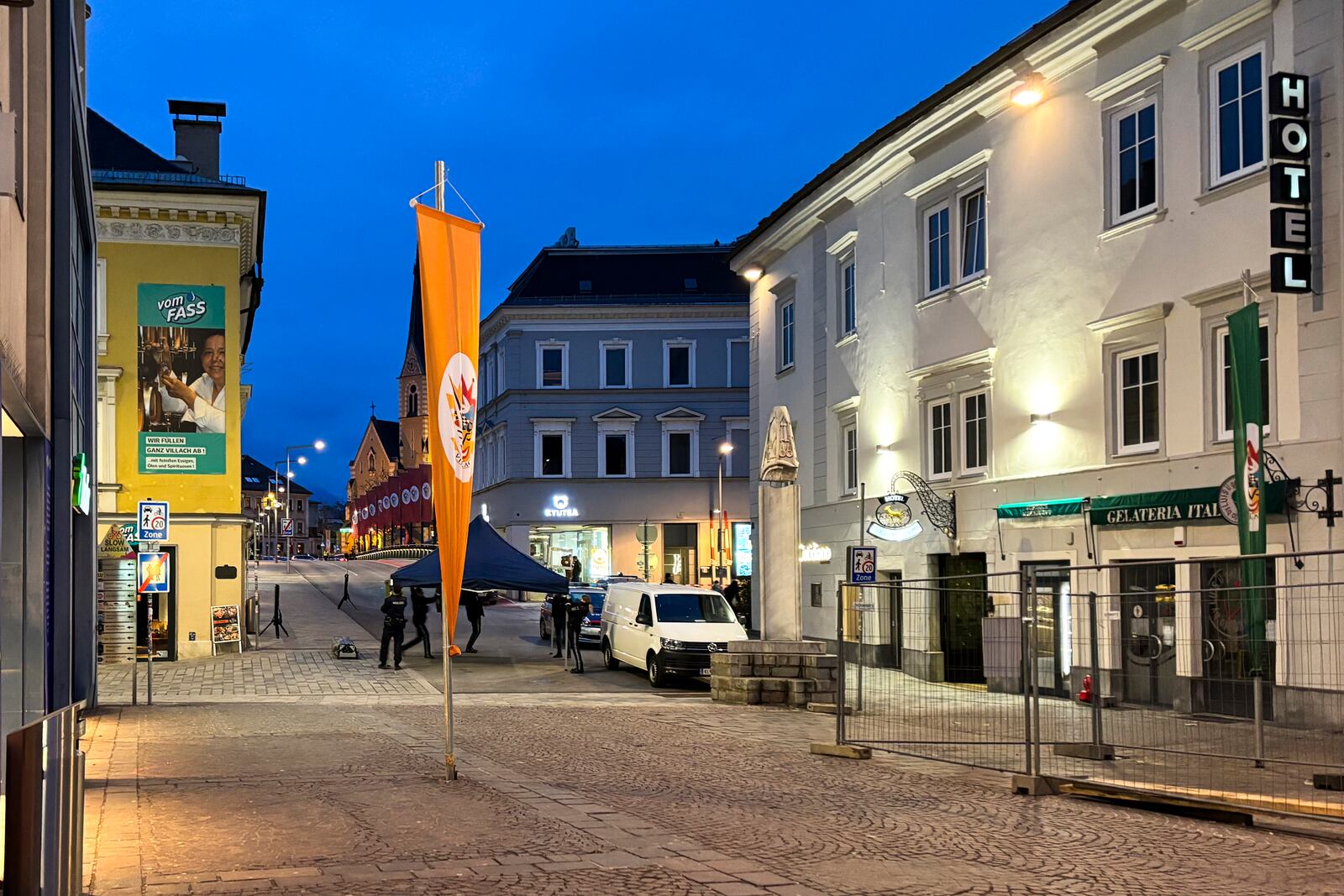 Police officers work at the scene where a 23-year-old man stabbed several people in the southern Austria city of Villach, Saturday, Feb. 15, 2025. (Wiesflecker/Kleine Zeitung via AP)