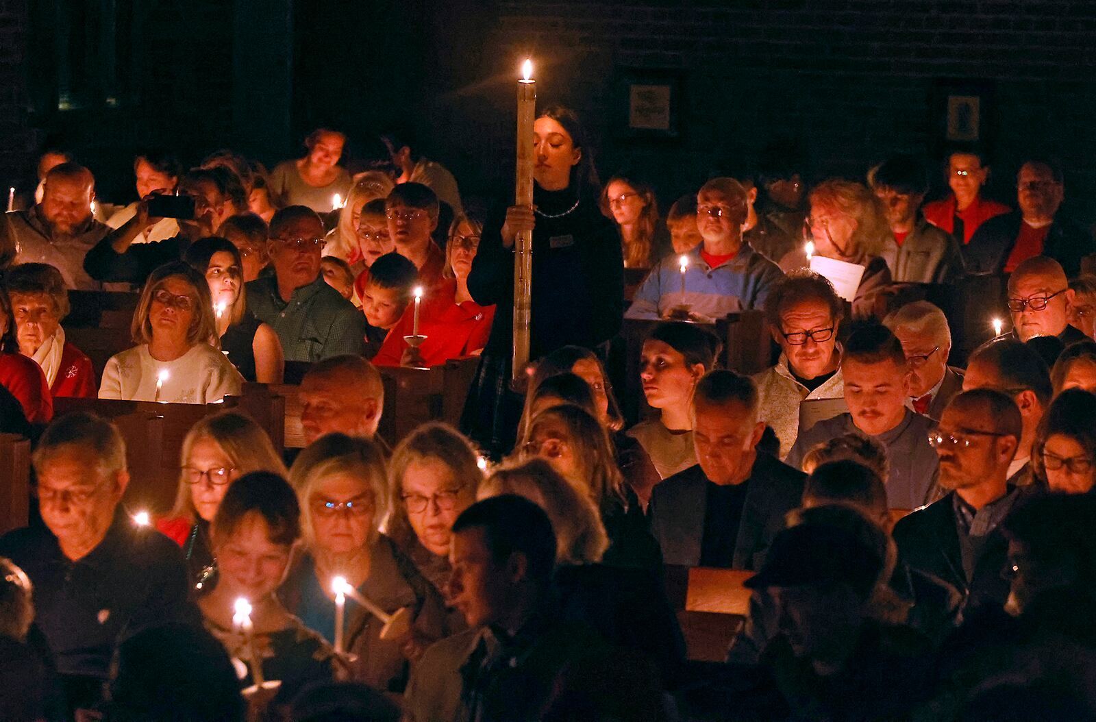 It was a full house for the Lessons and Carols for Advent and Christmas ceremony at Weaver Chapel on the Wittenberg University campus in Springfield Friiday, Dec. 8, 2023. BILL LACKEY/STAFF