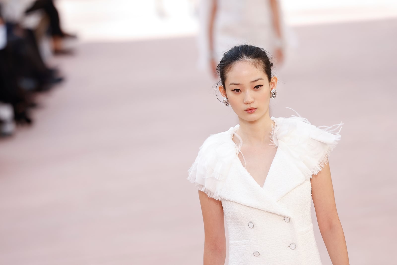 A model wears a creation as part of the Chanel Spring/Summer 2025 collection presented Tuesday, Oct. 1, 2024, in Paris. (Photo by Vianney Le Caer/Invision/AP)