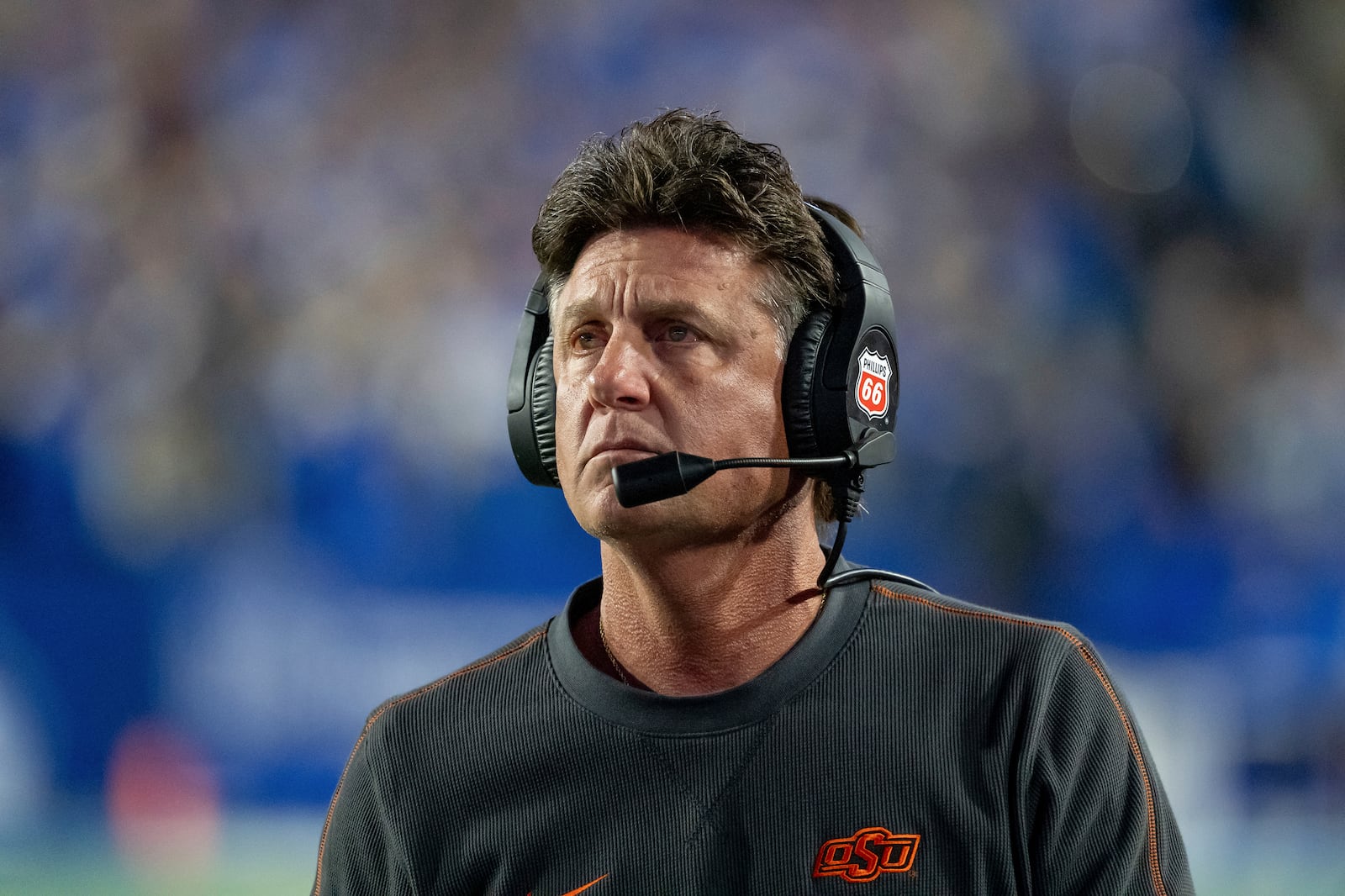 Oklahoma State head coach Mike Gundy looks on in the first half of an NCAA college football game against BYU, Friday, Oct. 18, 2024, in Provo, Utah. (AP Photo/Spenser Heaps)