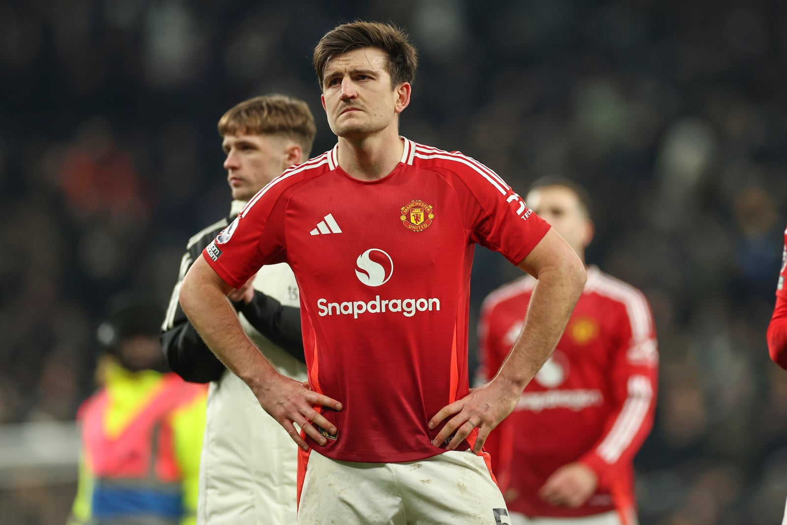 Manchester United's Harry Maguire reacts after the English Premier League soccer match between Tottenham Hotspur and Manchester United in London, Sunday, Feb. 16, 2025. (AP Photo/Ian Walton)