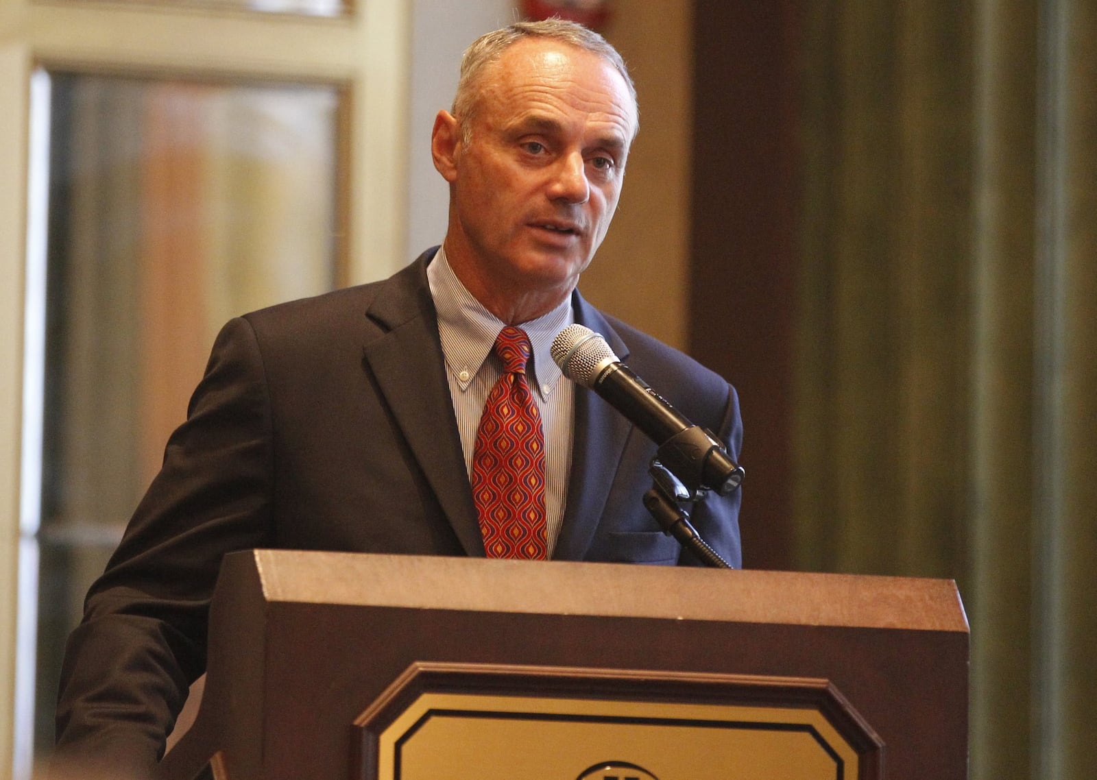 Major League Baseball Commissioner Rob Manfred speaks at a Baseball Writers Association of America meeting on Tuesday, July 14, 2015, at Cincinnati. David Jablonski/Staff