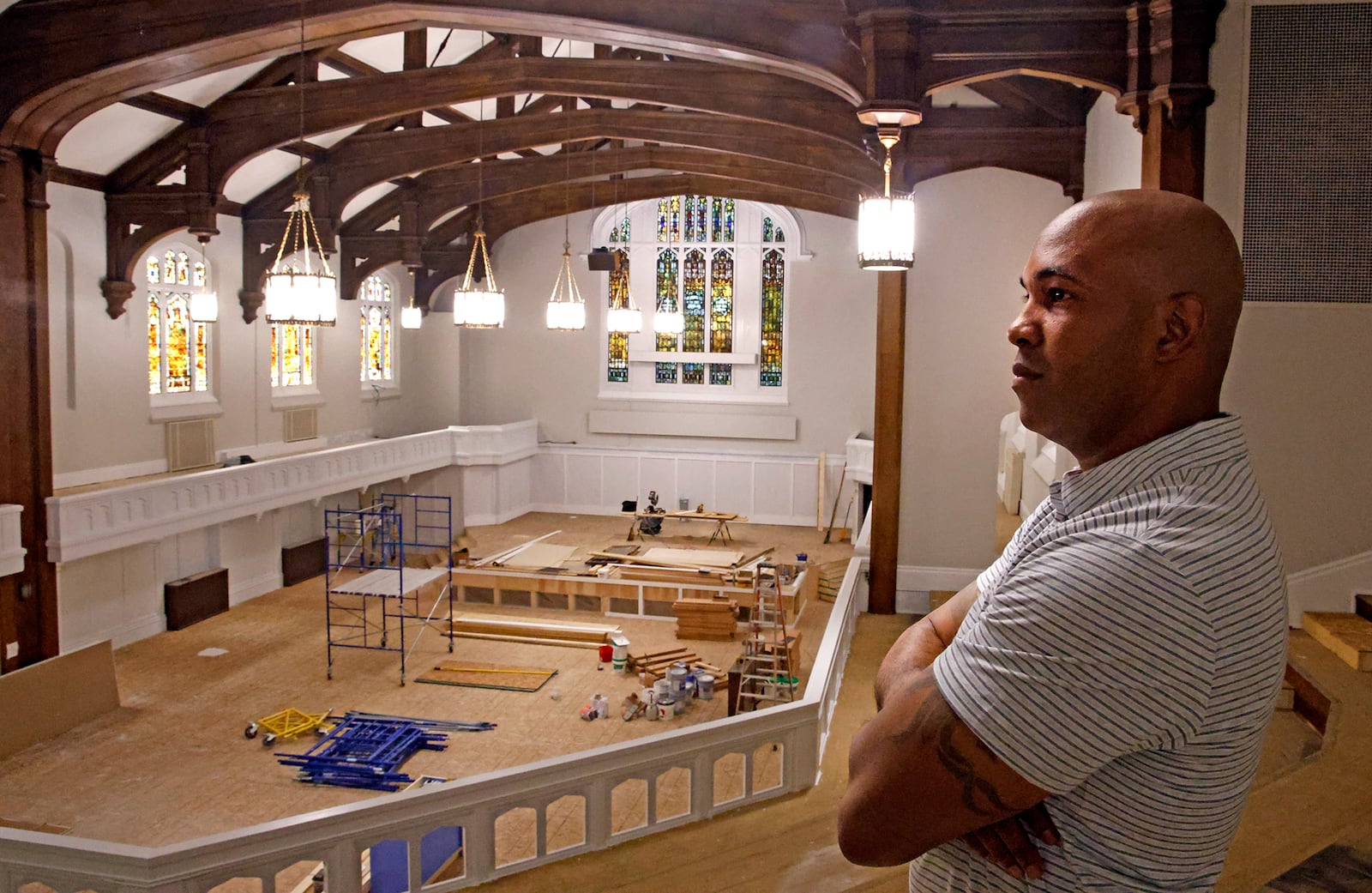 Levi Duncan looks over the banquet room in The Metropolis Friday, June 21, 2024. BILL LACKEY/STAFF