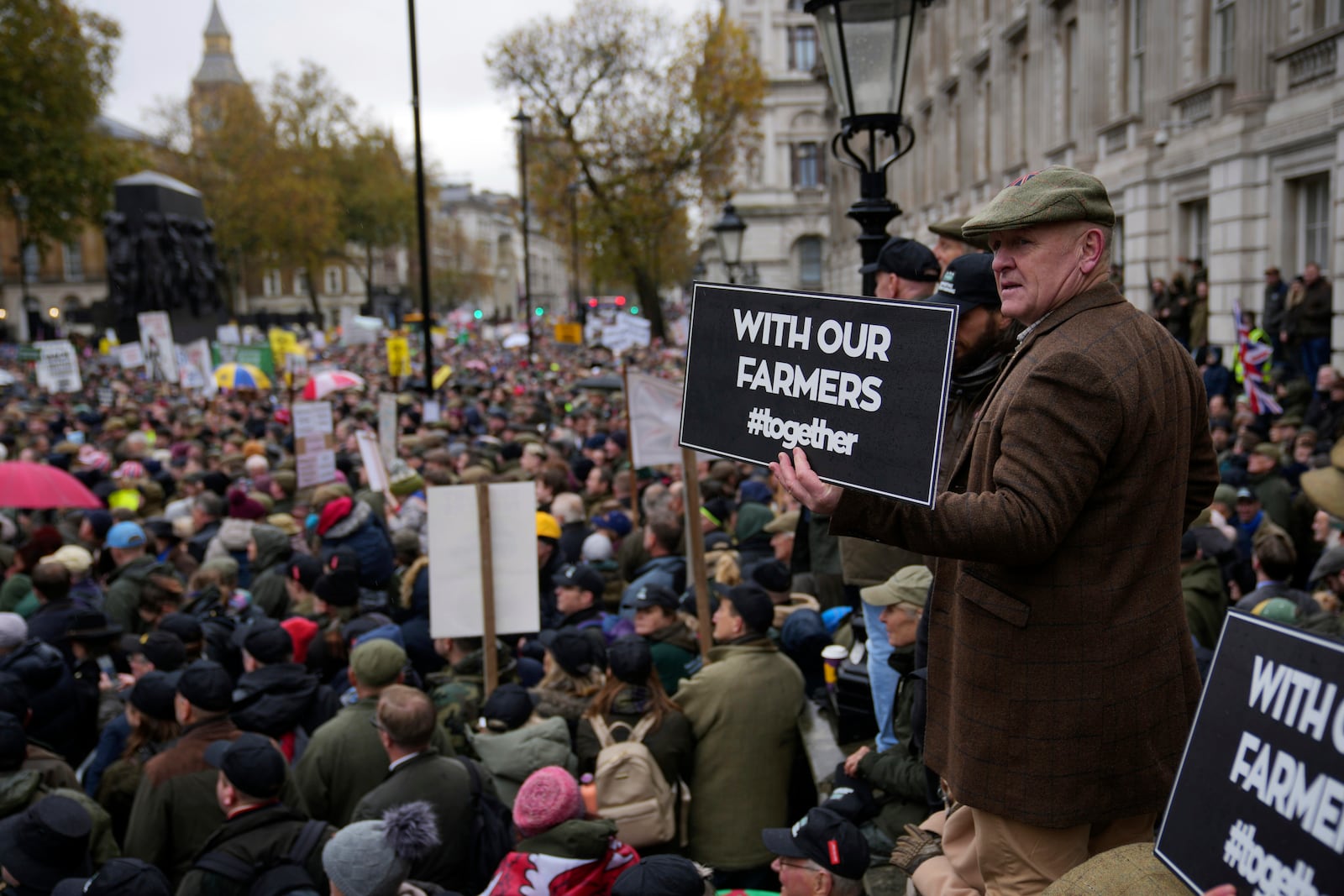 Farmers protest to urge the government to change course over its inheritance tax plans, in London, Tuesday, Nov. 19, 2024. (AP Photo/Kin Cheung)