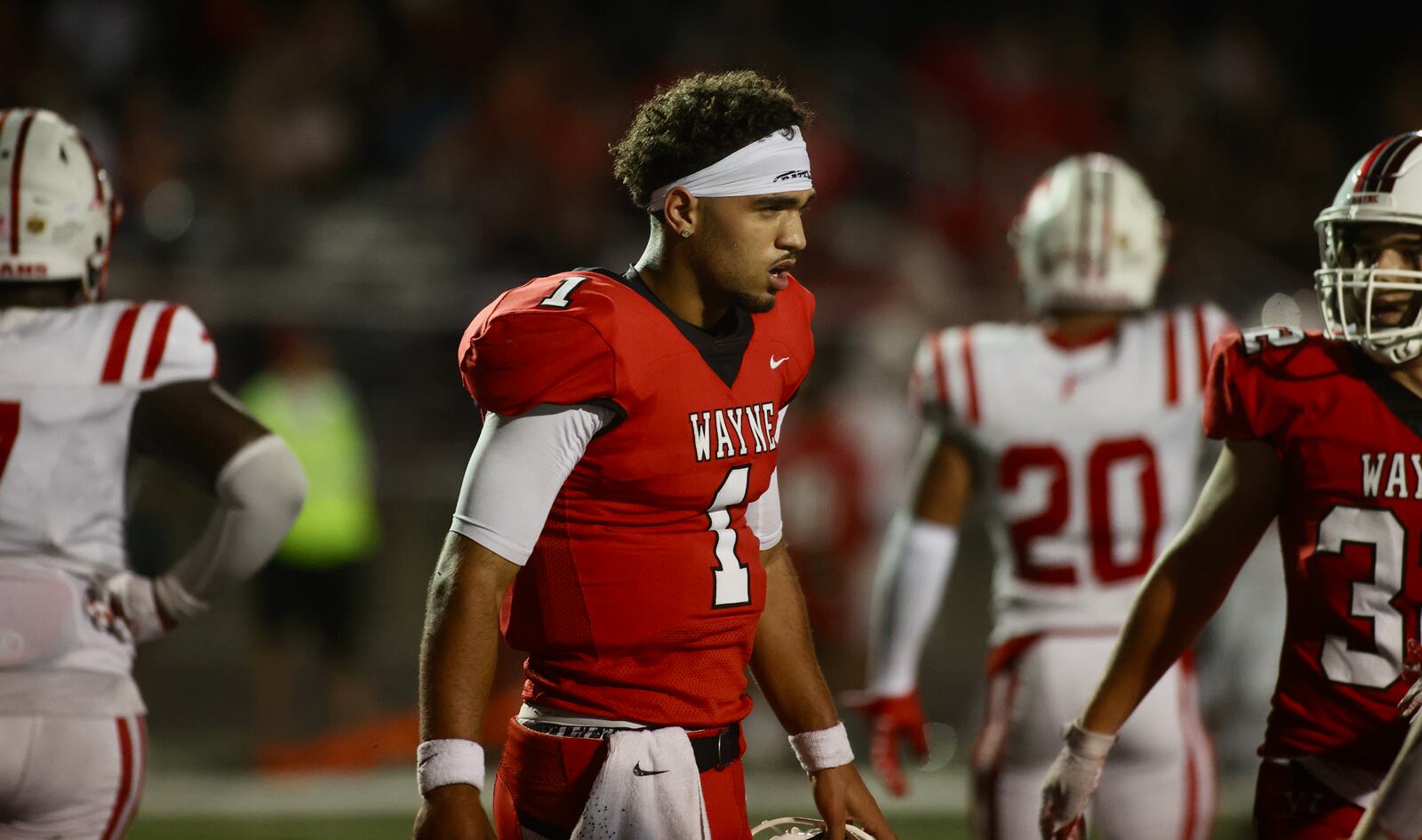 Wayne's Tyrell Lewis returns to the bench after running for a score against Fairfield in the second half on Friday, Aug.18, 2023, at Heidkamp Stadium in Huber Heights. David Jablonski/Staff