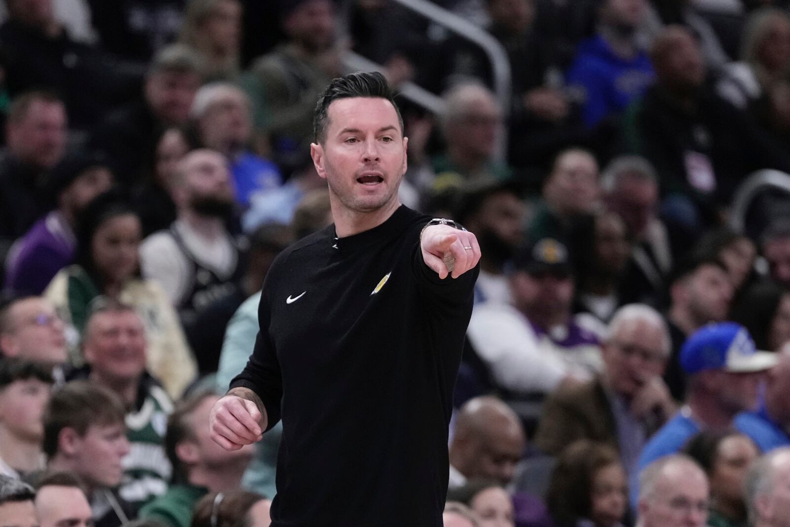 Los Angeles Lakers head coach JJ Redick reacts during the first half of an NBA basketball game Thursday, Mar. 13, 2025, in Milwaukee. (AP Photo/Morry Gash)