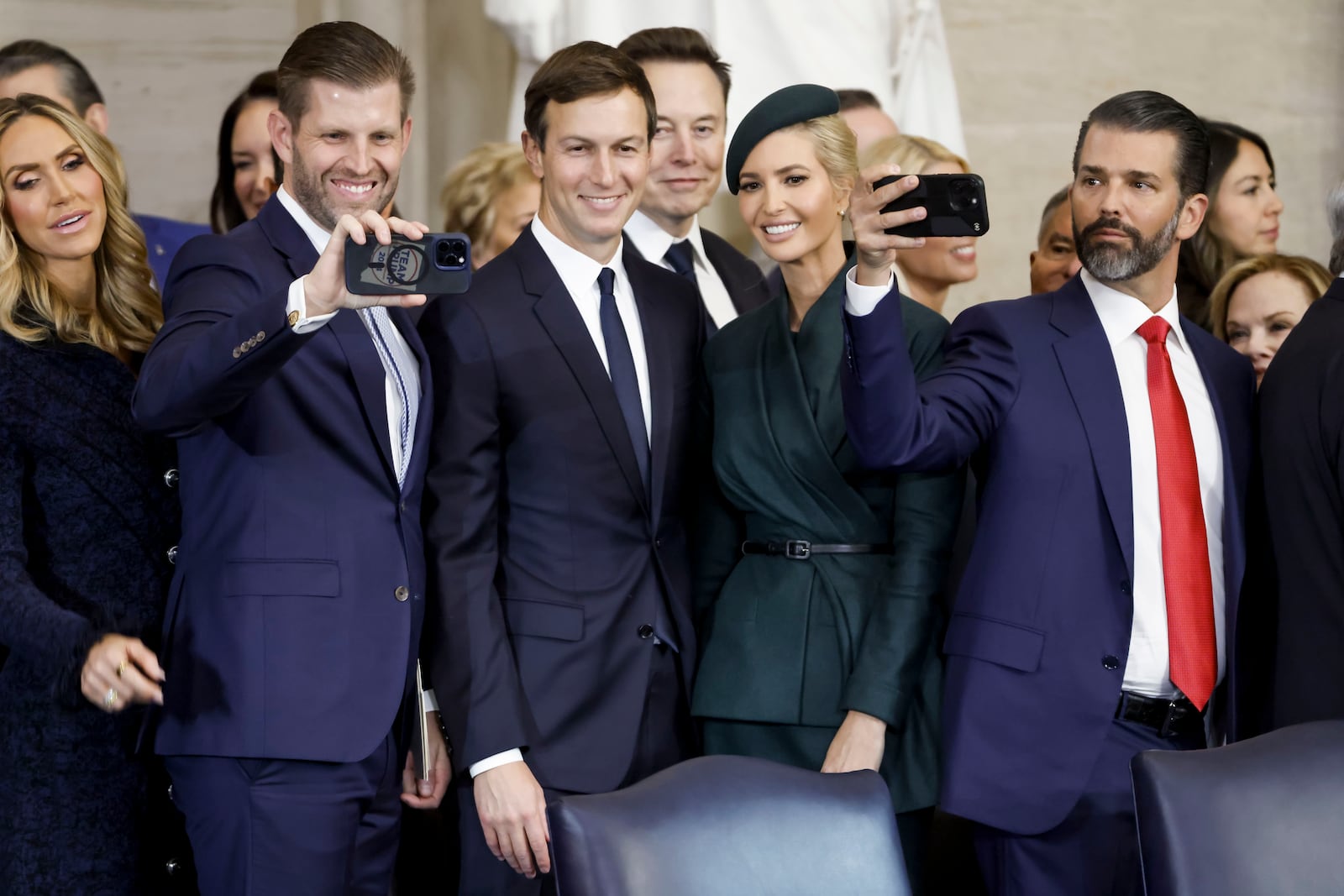 From left, Larua Trump, Eric Trump, Elon Musk, Ivanka Trump, and Donald Trump Jr., stand together following the 60th Presidential Inauguration for President Donald Trump, in the Rotunda of the U.S. Capitol in Washington, Monday, Jan. 20, 2025. (Shawn Thew/Pool photo via AP)