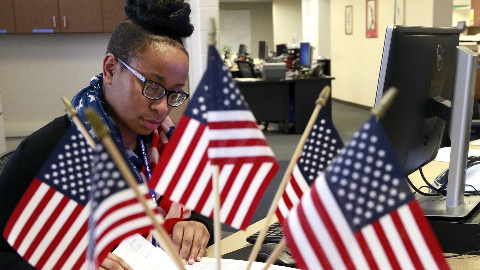 Camille Hall looks over petitions for the May ballot at the Clark County Board of Elections Wednesday. Bill Lackey/Staff