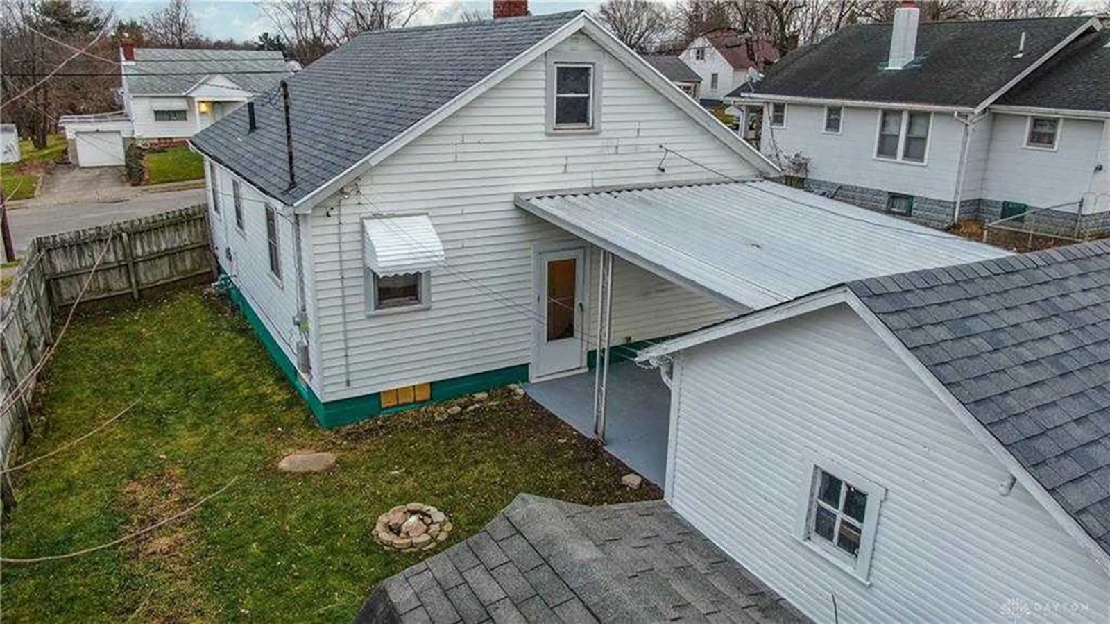 The rear of the home has a fully fenced back yard, storage shed, 1-car detached garage and concrete covered patio. CONTRIBUTED PHOTO