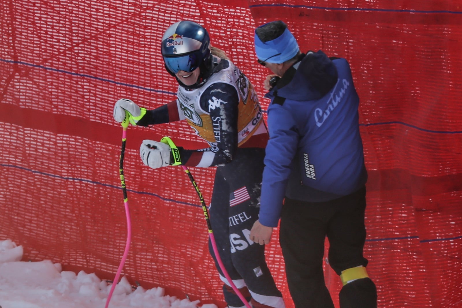 United States' Lindsey Vonn looks on after crashing during an alpine ski, women's World Cup downhill training, in Cortina d'Ampezzo, Italy, Thursday, Jan. 16, 2025. (AP Photo/Marco Trovati)