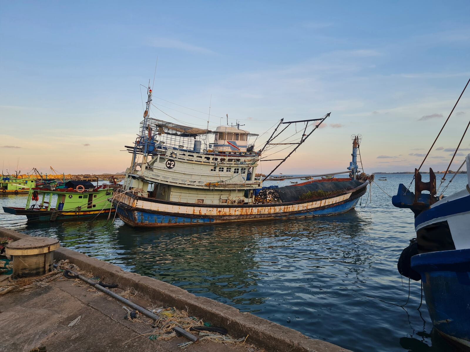 This undated photo shows Vietnamese owned fishing vessels that are registered to a Malaysian company docked at a Malaysian port. (Panthera/Sunway University via AP)