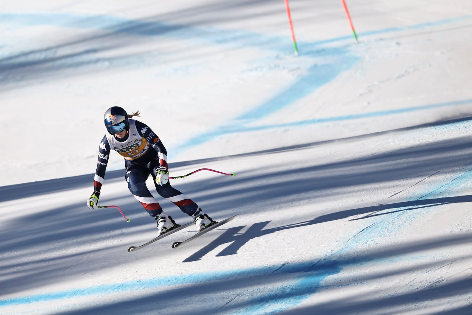 United States' Lindsey Vonn speeds down the course during an alpine ski, women's World Cup downhill, in Cortina d'Ampezzo, Italy, Saturday, Jan. 18, 2025 (AP Photo/Marco Trovati)