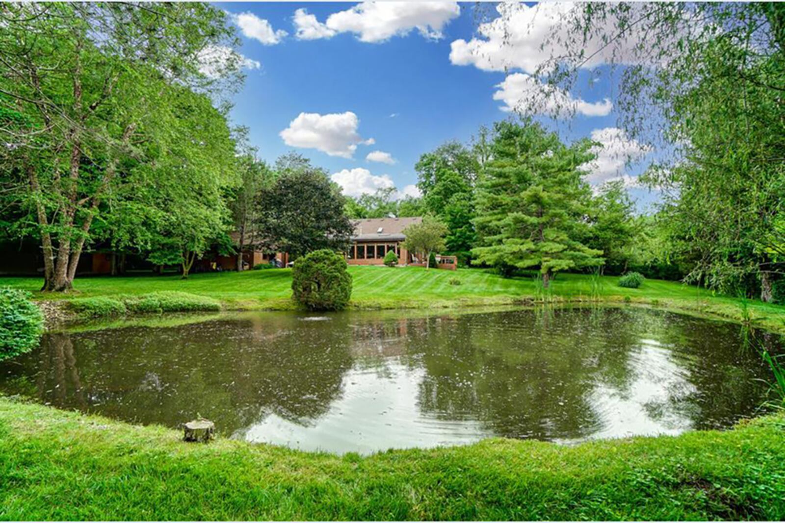 The cedar-sided, A-frame home backs to C.J. Brown Reservoir at Buck Creek State Park. A pond is behind the home. CONTRIBUTED PHOTO