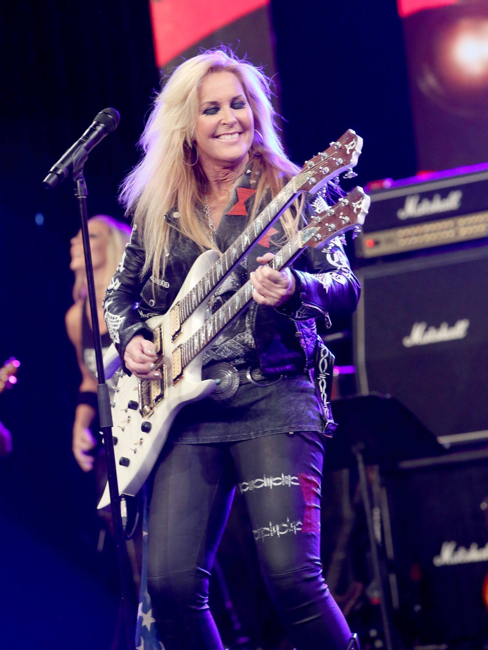 ANAHEIM, CA - JANUARY 20:  Guitarist Lita Ford performs on stage at the She Rocks Awards during the 2017 NAMM Show at the Anaheim Convention Center on January 20, 2017 in Anaheim, California.  (Photo by Jesse Grant/Getty Images for NAMM)