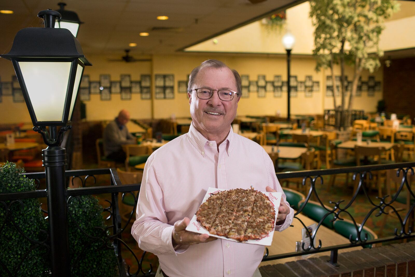 Roger Glass, owner, Marion's Piazza inside the Shroyer Rd. location.  TY GREENLEES / STAFF FILE PHOTO