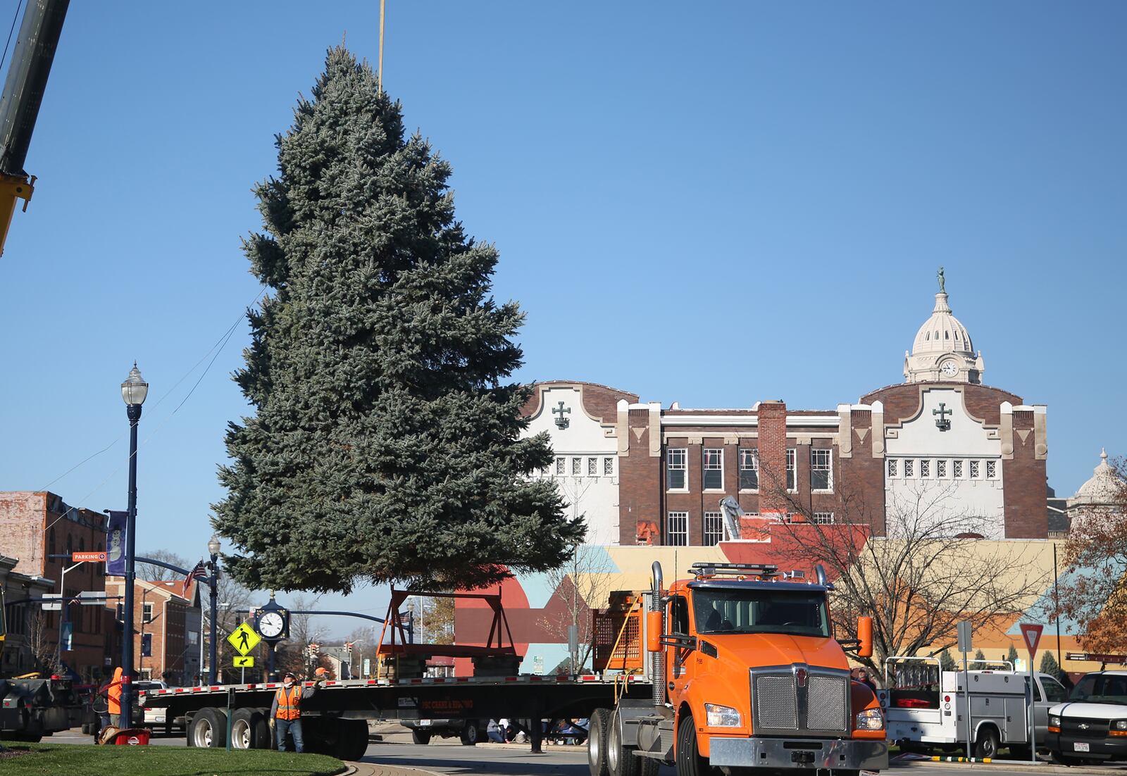 The Christmas tree for Troy's Public Square was delivered Thursday, Nov. 12. The city's Holiday Lighting 2020 event kicks off Friday, Nov. 27 at 6:30 p.m. There will be Christmas music, the arrival of Santa on a fire truck and the annual lighting of the tree and levee lights. Facial coverings and social distancing are encouraged and commemorative masks will be available. LISA POWELL / STAFF