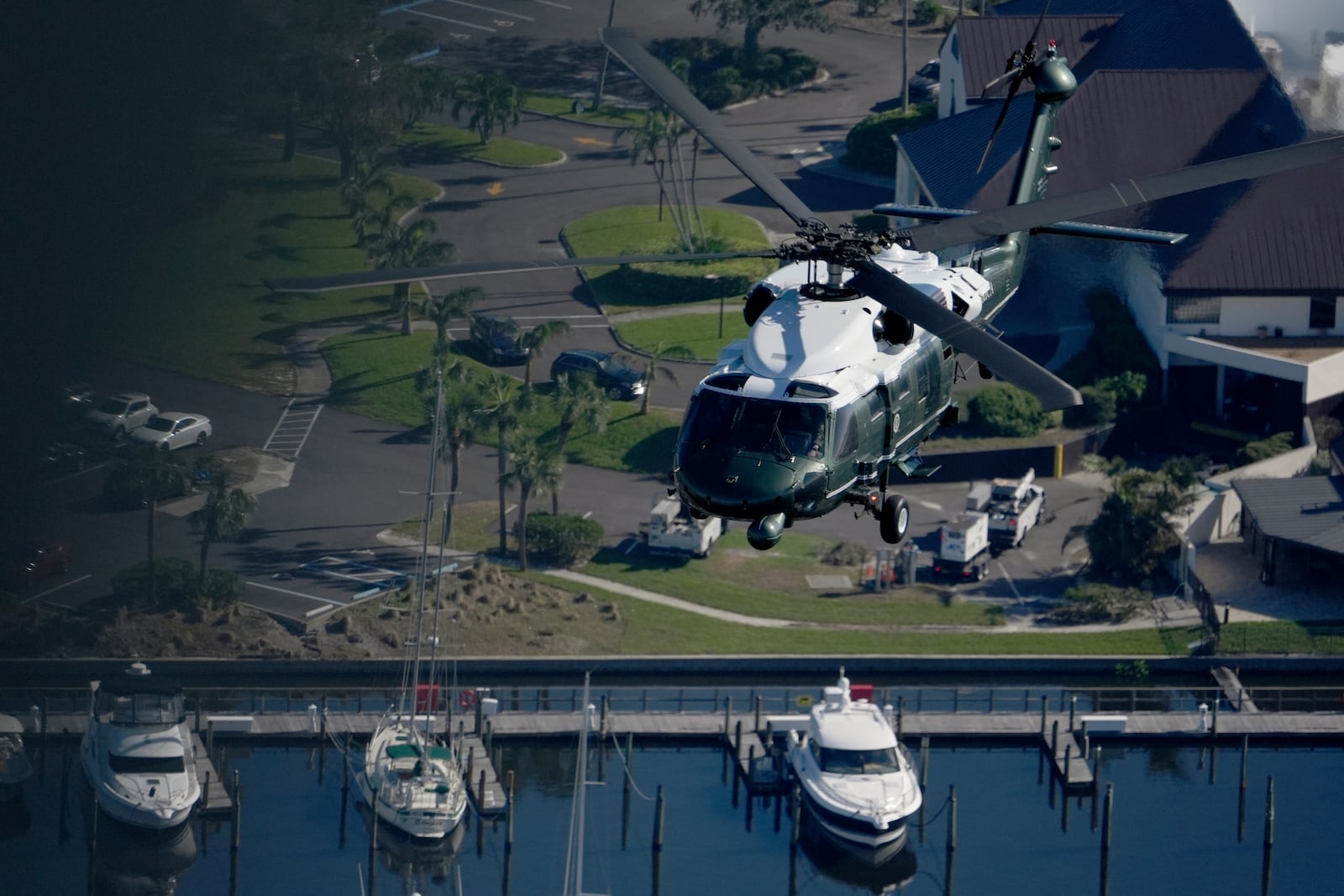 With President Joe Biden aboard, Marine One surveys areas affected by Hurricane Milton in Florida, from Tampa to St. Petersburg, Sunday, Oct. 13, 2024. (AP Photo/Manuel Balce Ceneta)