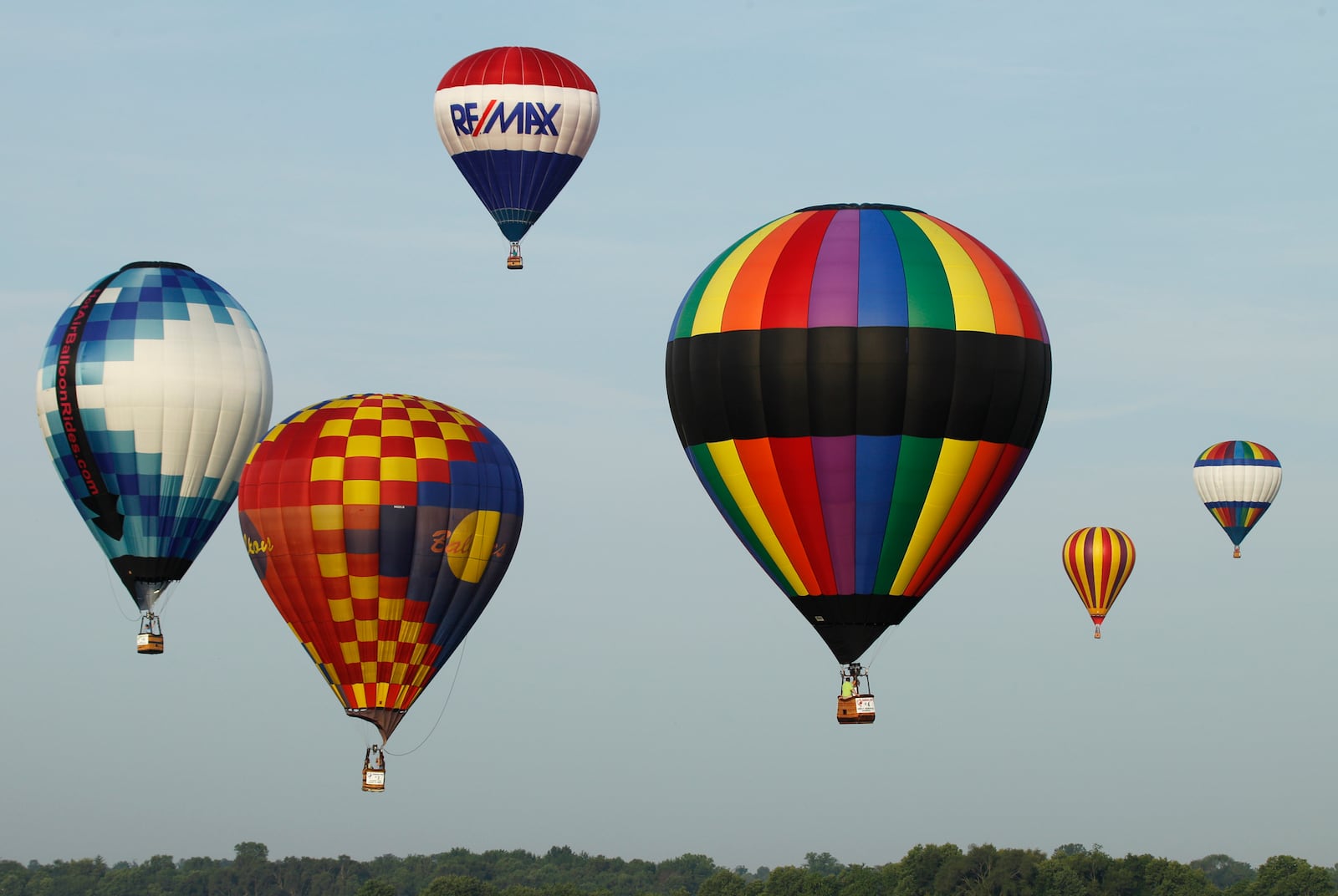 Eleven hot air balloons landed at Grimes Field in Urbana after a morning flight on Saturday, July 7, 2012, during the sixth annual Balloon Fest which is coordinated by the Champaign County Visitors Bureau. Staff photo by Barbara J. Perenic