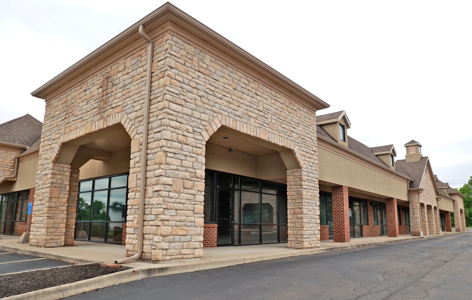 The site of a new branch of the Clark County Public Library in a plaza along Tuttle Road Thursday, June 22, 2023. BILL LACKEY/STAFF