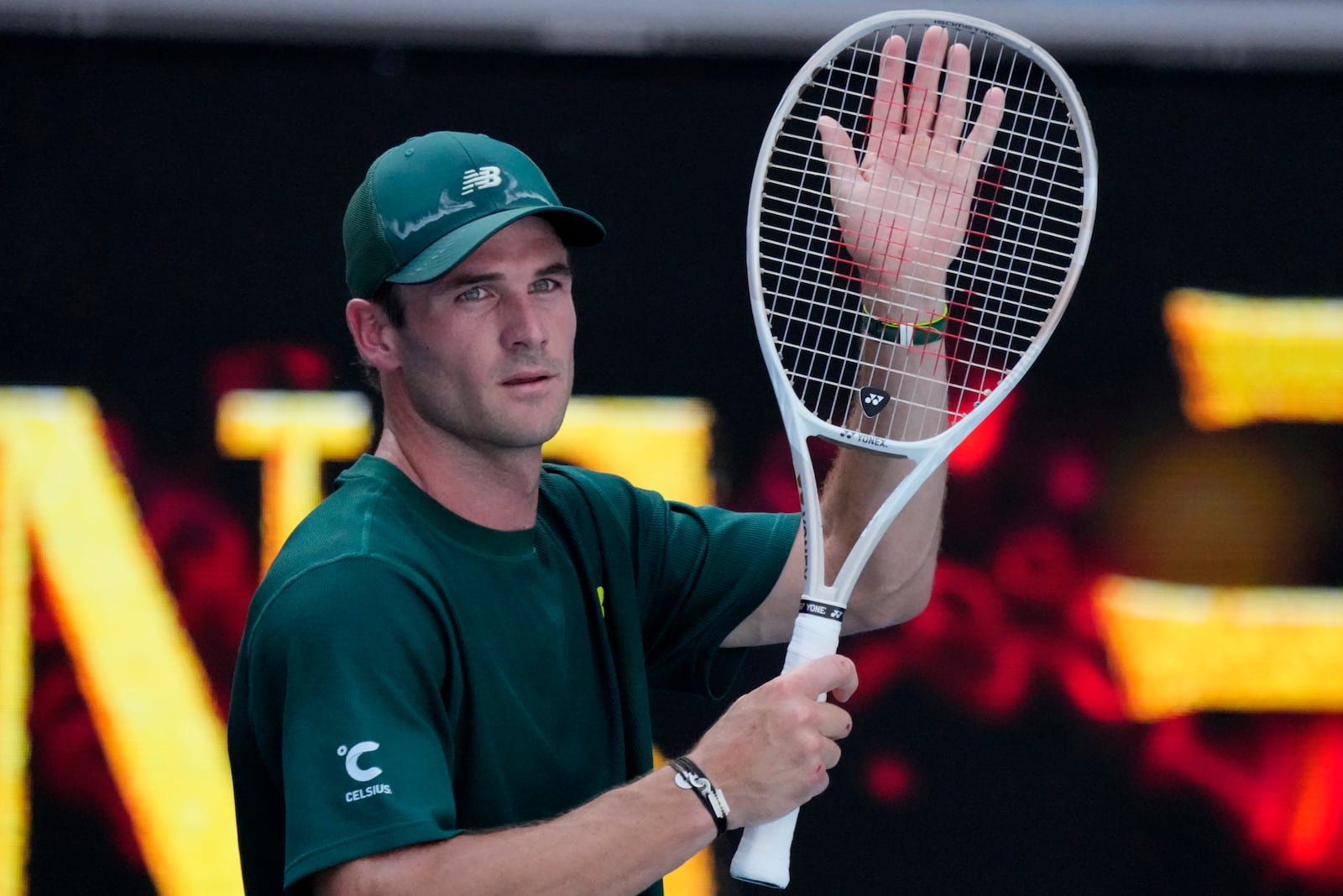 Tommy Paul of the U.S. celebrates after defeating Alejandro Davidovich Fokina of Spain in a fourth round match at the Australian Open tennis championship in Melbourne, Australia, Sunday, Jan. 19, 2025. (AP Photo/Vincent Thian)