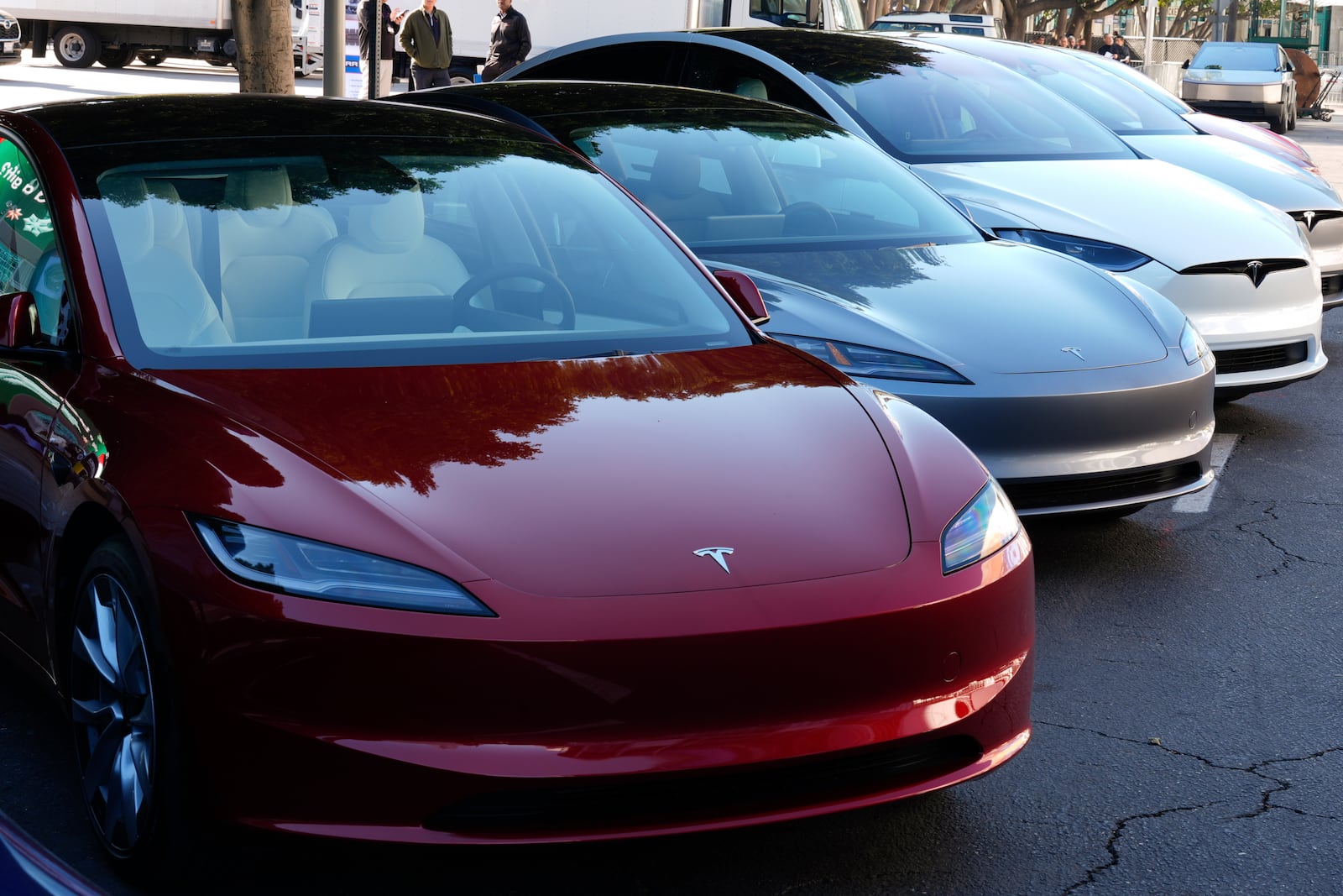 FILE - Tesla vehicles are displayed at the AutoMobility LA Auto Show, Thursday, Nov. 21, 2024, in Los Angeles. (AP Photo/Damian Dovarganes, File)