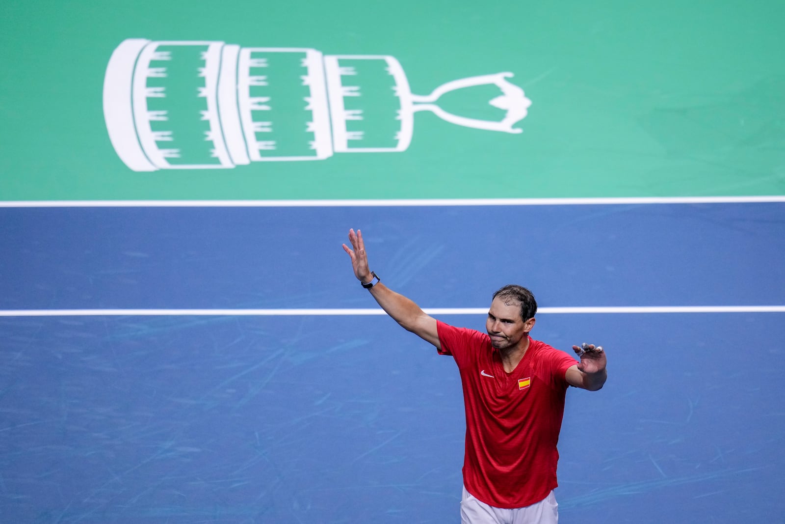 FILE - Spain's tennis player Rafael Nadal waves to the crowd after losing against Netherlands' Botic Van De Zandschulp during a Davis Cup quarterfinal match at Martin Carpena Sports Hall in Malaga, southern Spain, on Tuesday, Nov. 19, 2024. (AP Photo/Manu Fernandez, File)