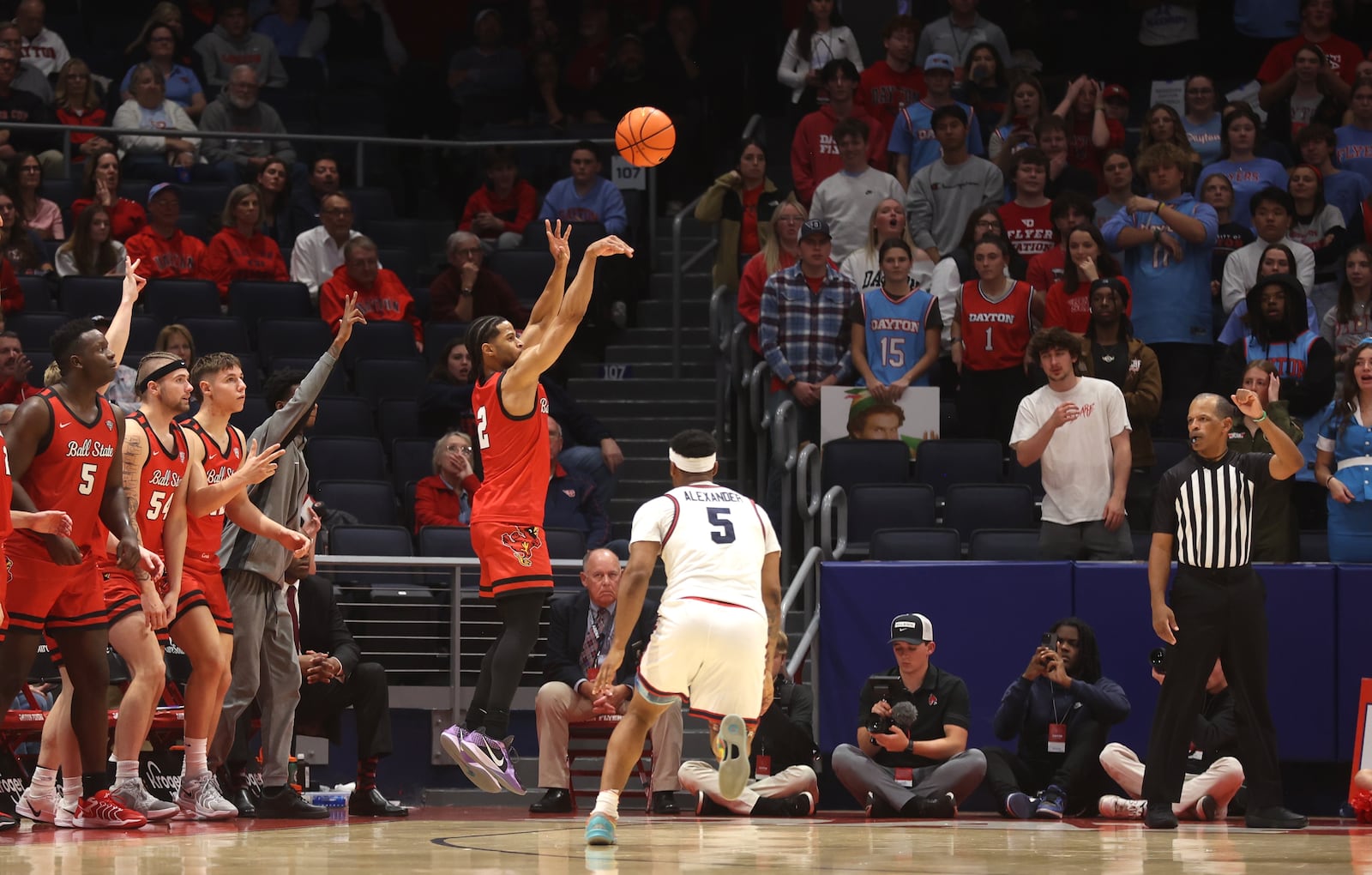 Ball State's Ethan Brittain-Watts makes a 3-pointer against Dayton on Wednesday, Nov. 13, 2024, at UD Arena. David Jablonski/Staff