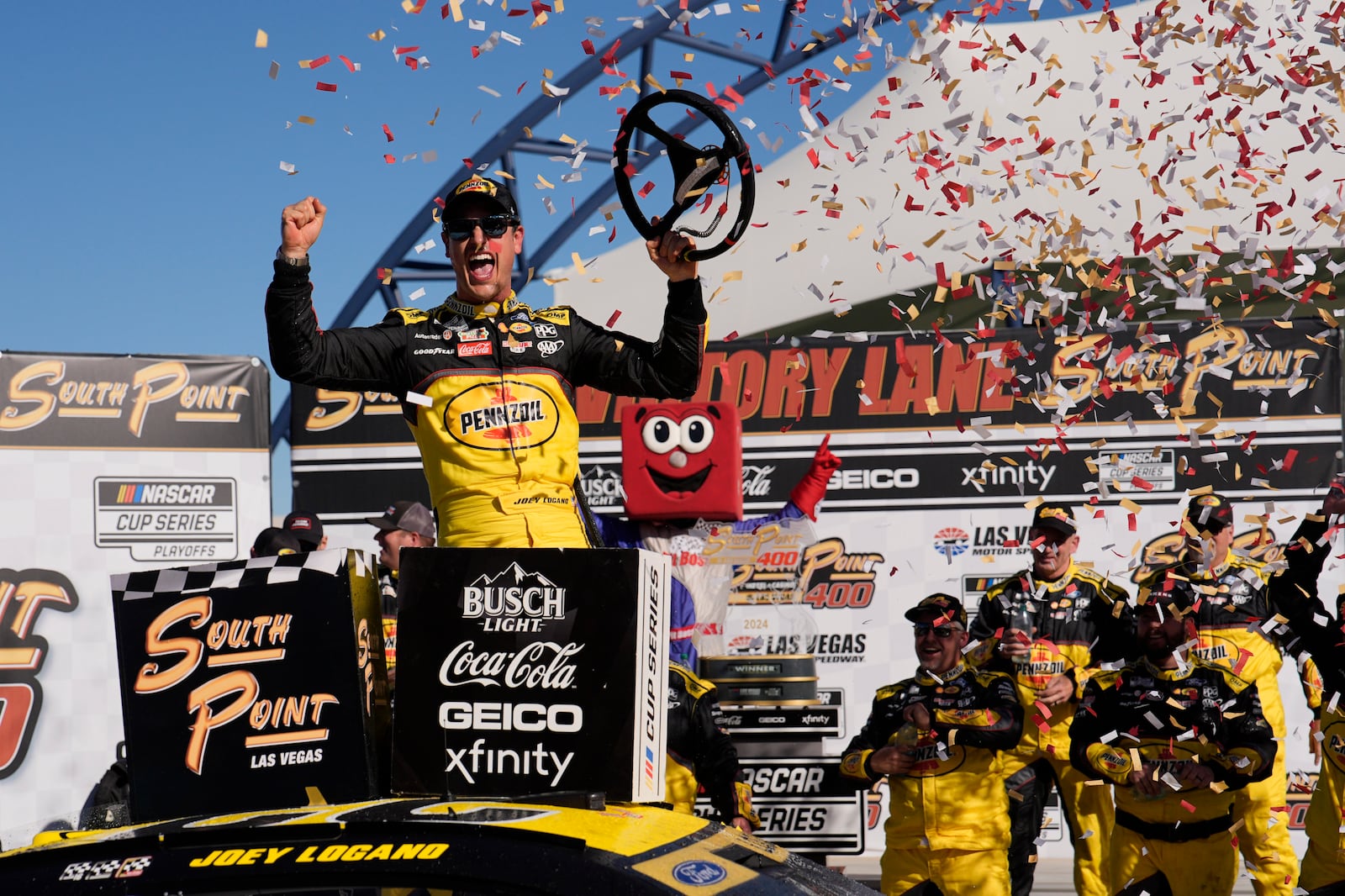 NASCAR Cup Series driver Joey Logano (22) celebrates after winning a NASCAR Cup Series auto race Sunday, Oct. 20, 2024, in Las Vegas. (AP Photo/John Locher)