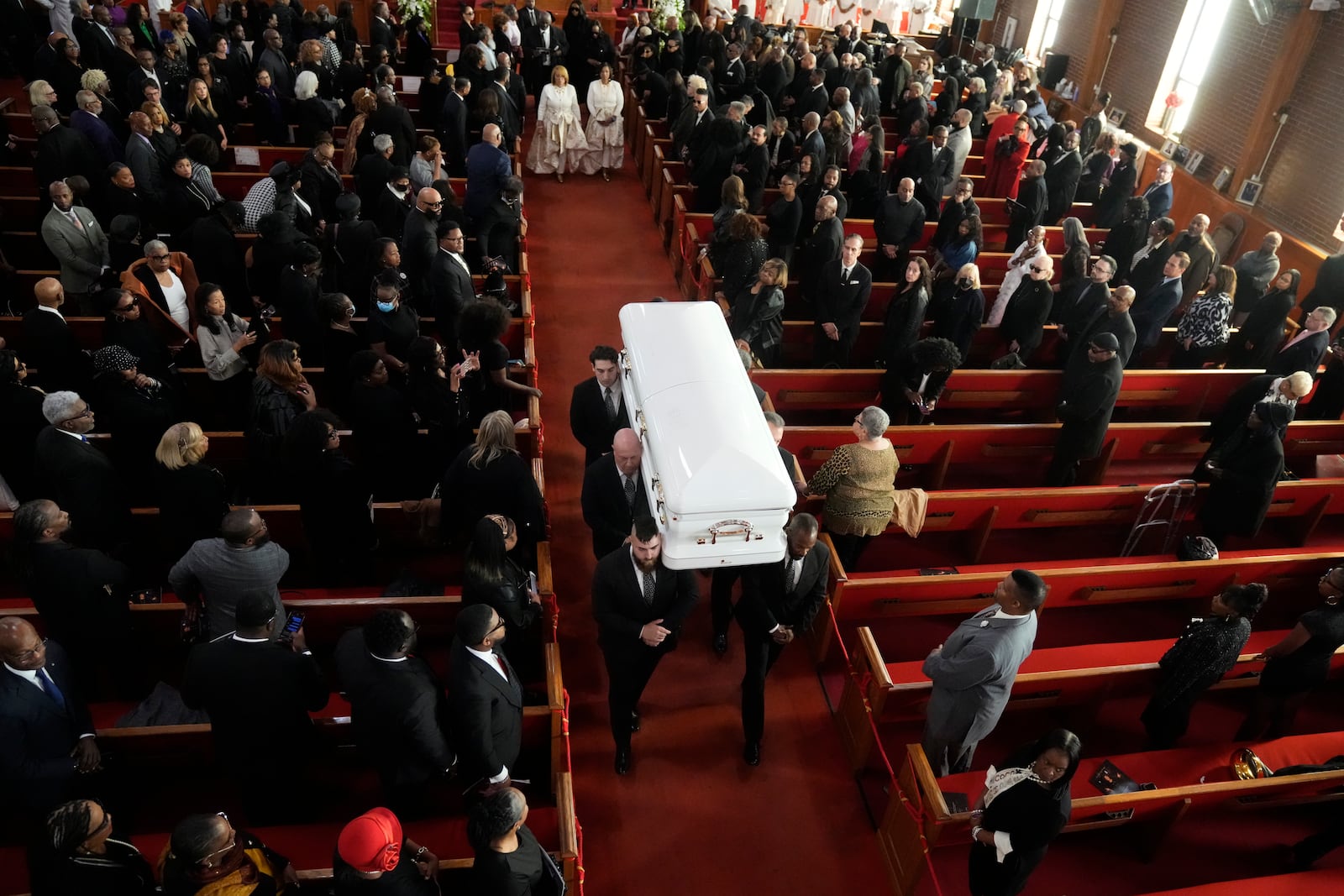 Pallbearers carry Cissy Houston's casket following a ceremony in celebration of her life on Thursday, Oct. 17, 2024, at the New Hope Baptist Church in Newark, N.J. (Photo by Charles Sykes/Invision/AP)