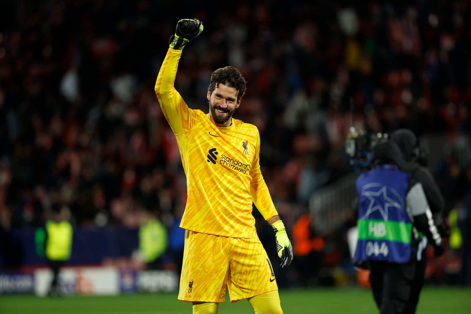 Liverpool's goalkeeper Alisson celebrates after their win in the Champions League soccer match against Girona at the Estadi Montilivi in Girona, Spain, Tuesday, Dec. 10, 2024. (AP Photo/Joan Monfort)