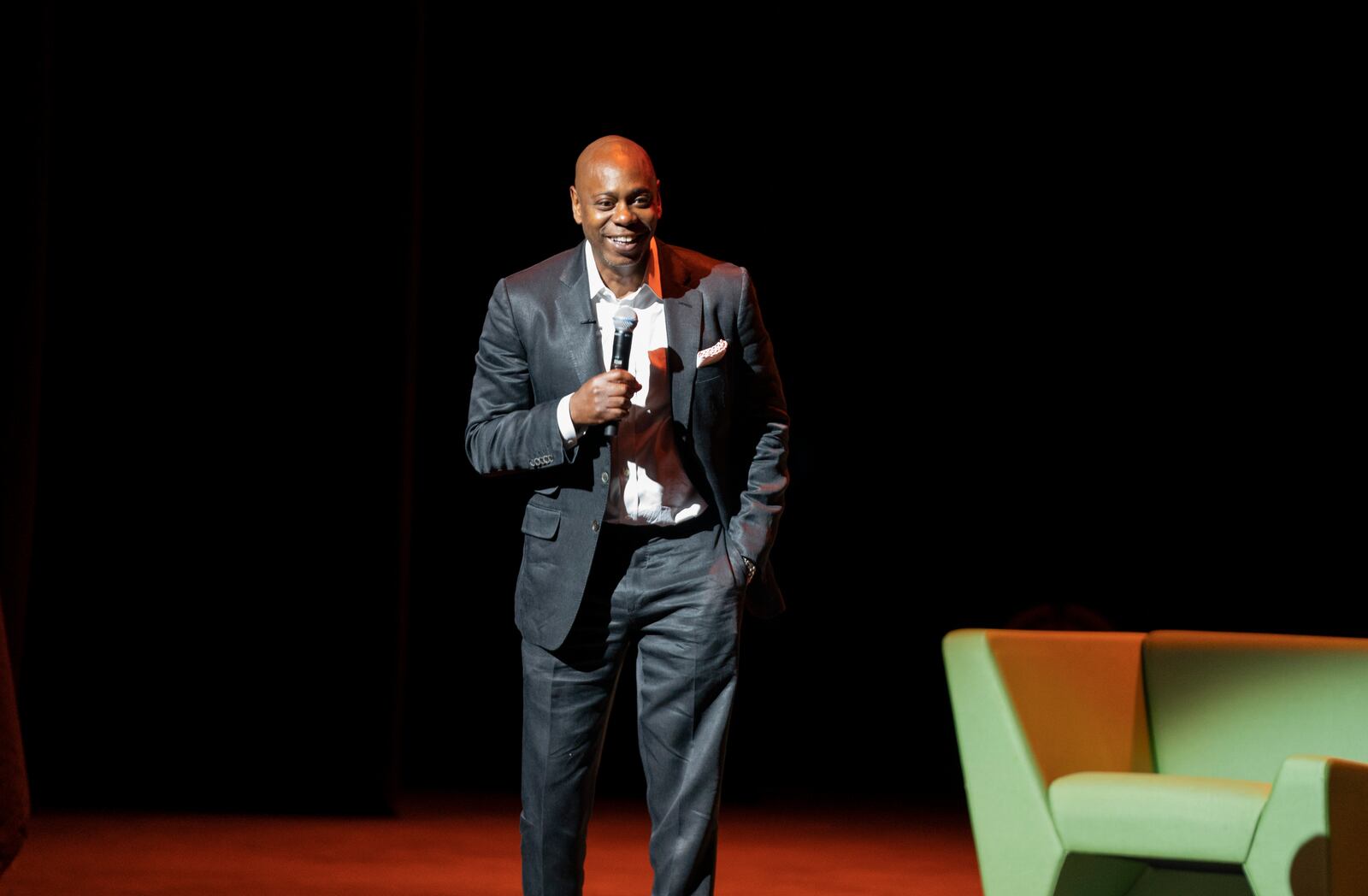 Dave Chappelle performs during a theater dedication ceremony honoring the comedian and actor, and to raise funds to support Duke Ellington School of the Arts in Washington, Monday, June. 20, 2022. (AP Photo/Gemunu Amarasinghe)