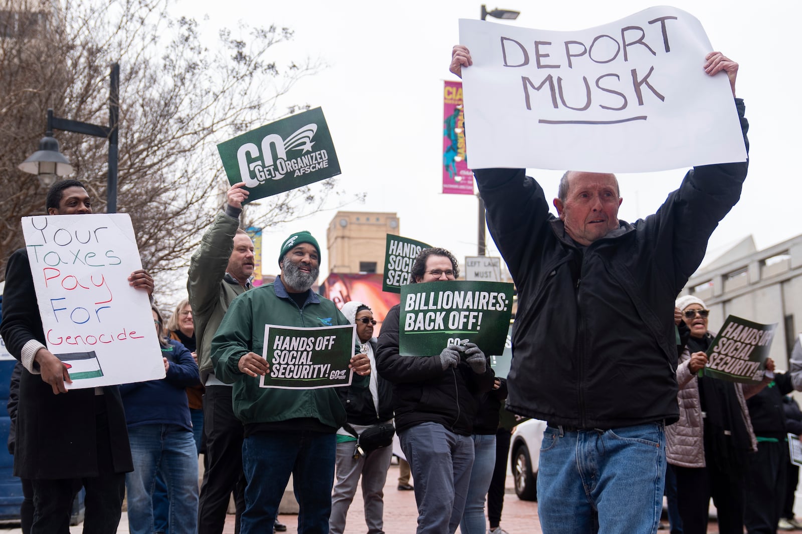 Demonstrators gather outside of the Edward A. Garmatz United States District Courthouse in Baltimore, on Friday, March 14, 2025, before a hearing regarding the Department of Government Efficiency's access to Social Security data. (AP Photo/Stephanie Scarbrough)