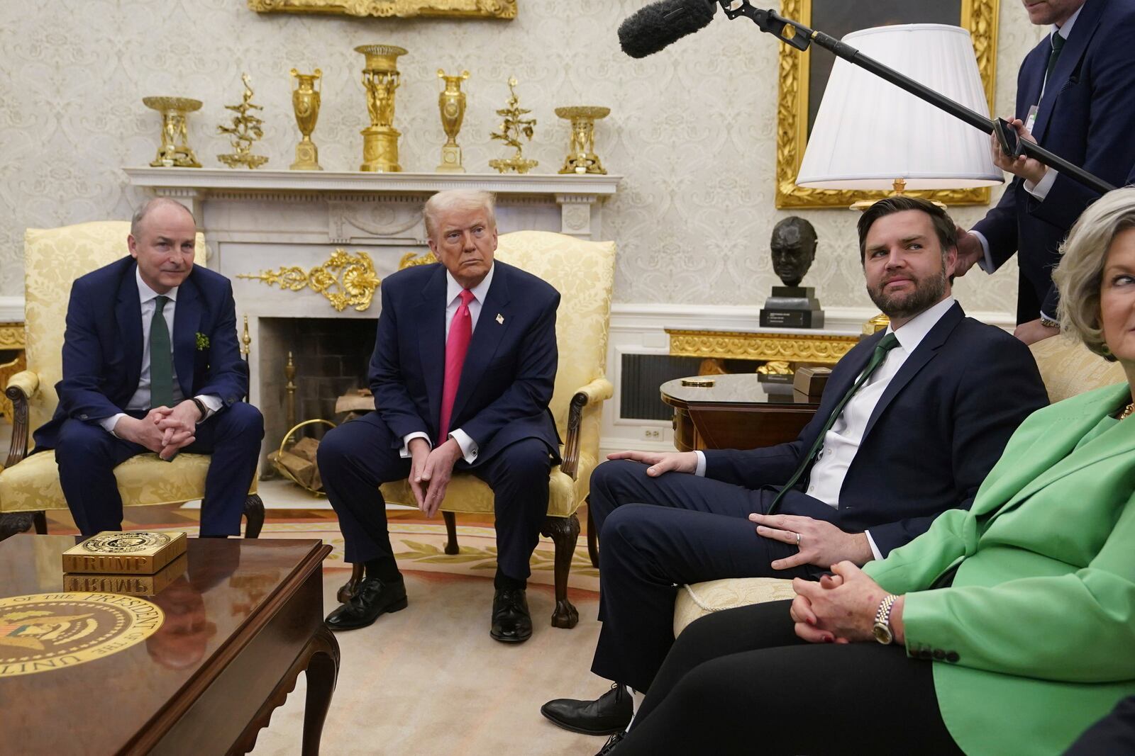 Vice President JD Vance, third left, joins Ireland's Taoiseach Micheal Martin, left, during a bilateral meeting with President Donald Trump ahead of the White House St Patrick's Day reception, Wednesday March 12, 2025, in Washington. (Niall Carson/PA via AP)