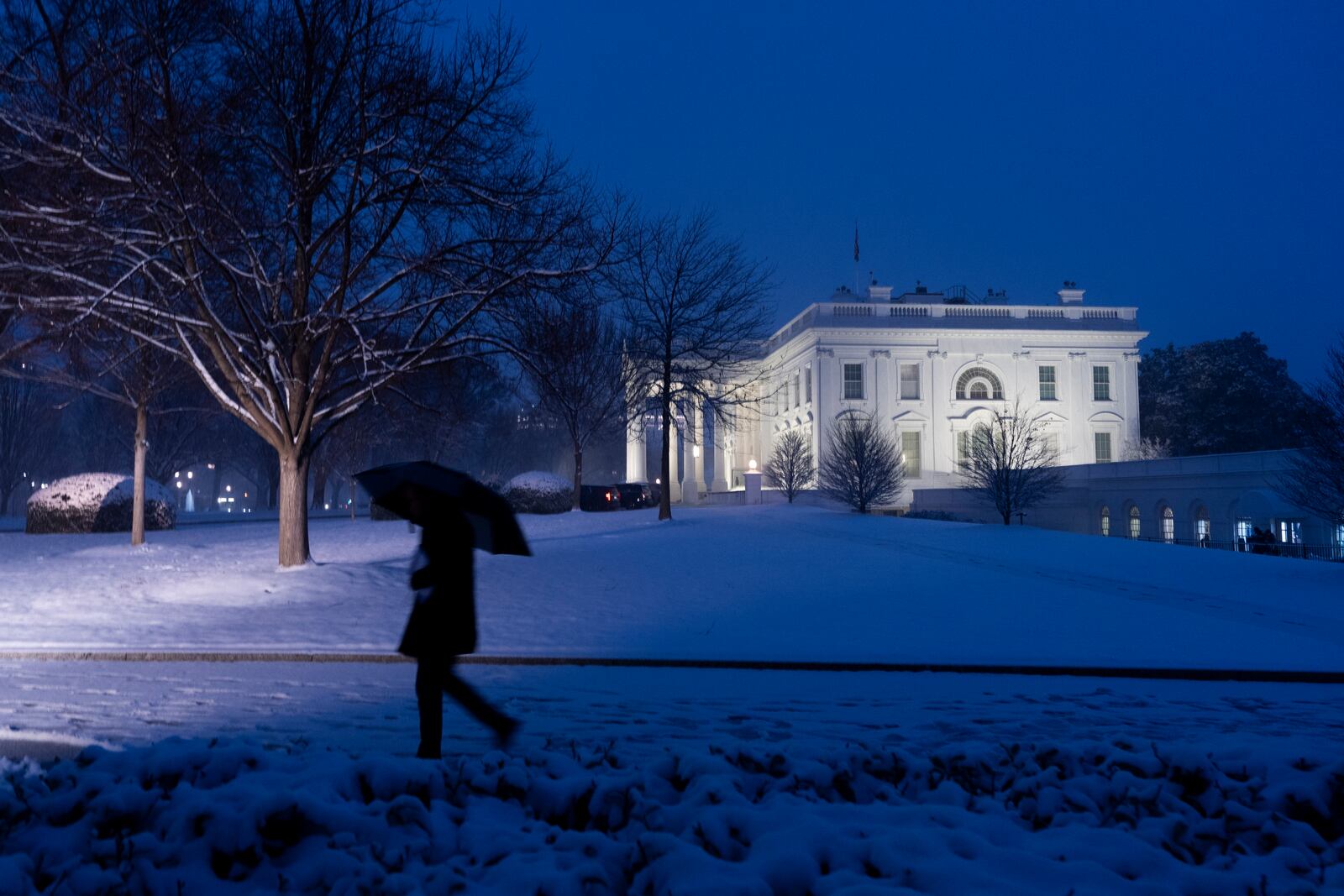 FILE - The White House is seen as the snow falls, Feb. 11, 2025, in Washington. (Photo/Alex Brandon, File)