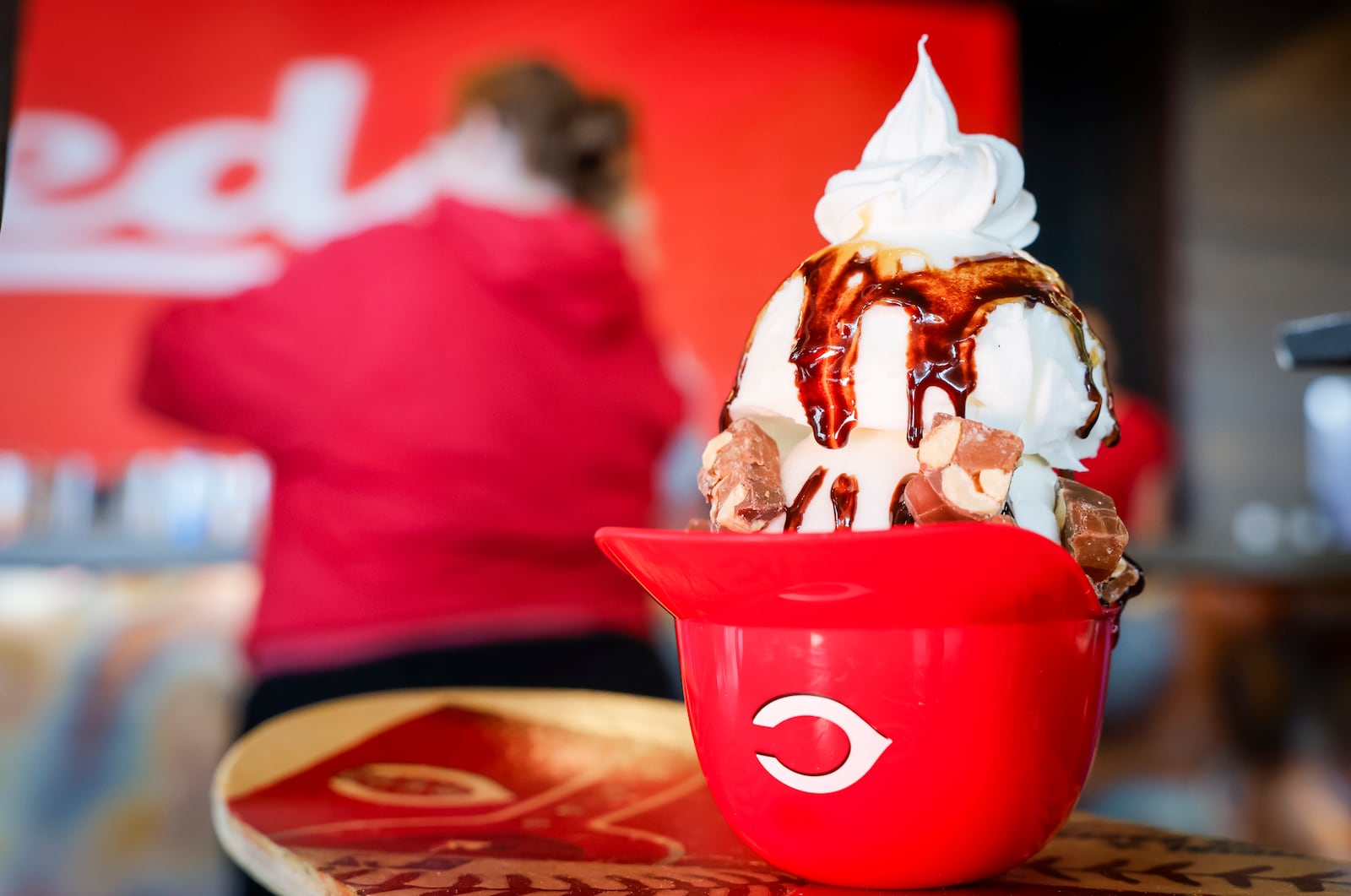 The Cincinnati Reds announced new menu items ahead of opening day on Friday, March 21, 2025 in The Handlebar at the Riverfront Club inside Great American Ball Park in Cincinnati. Executive Chef Gary Davis created a variety of new dishes for the upcoming season. This is the Baby Ruth  ice cream sundae. NICK GRAHAM/STAFF