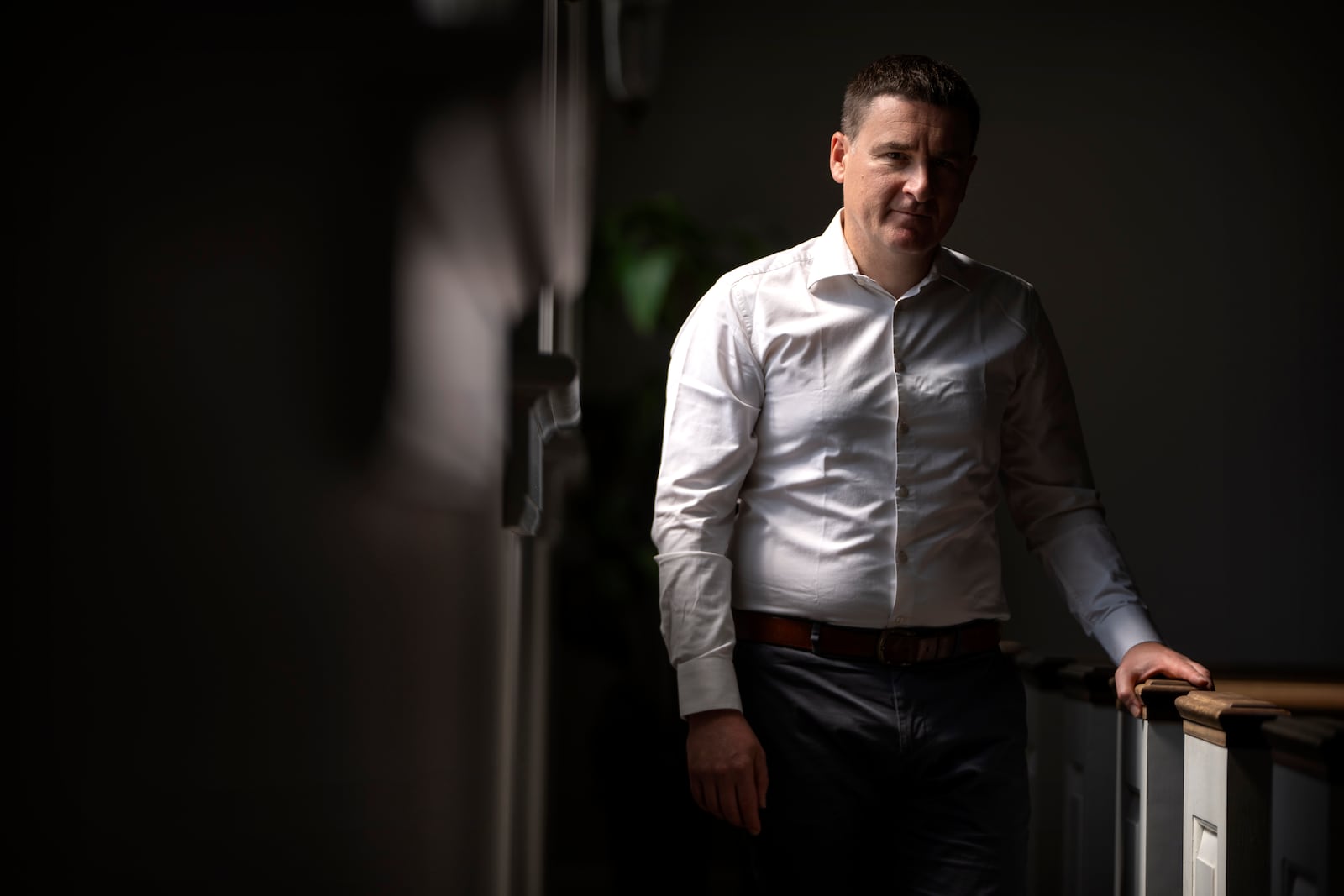 Slavik Pyzh, the president of the Ukrainian Baptist Theological Seminary in Lviv, Ukraine, stands in the sanctuary of a Baptist church in Arlington, Va., Tuesday, Sept. 3, 2024. (AP Photo/Mark Schiefelbein)