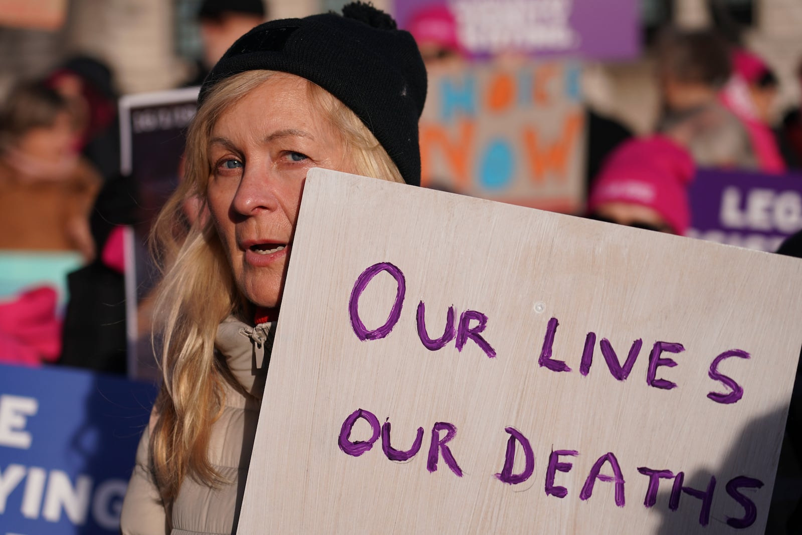 Pro legal assisted dying supporters demonstrate in front of Parliament in London, Friday, Nov. 29, 2024 as British lawmakers started a historic debate on a proposed to help terminally ill adults end their lives in England and Wales.(AP Photo/Alberto Pezzali)