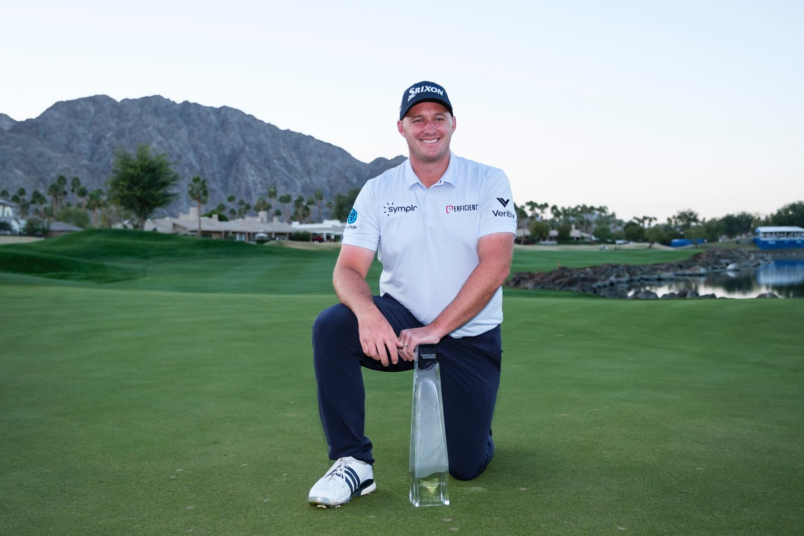 Sepp Straka poses with the trophy after winning the American Express golf tournament in La Quinta, Calif., Sunday, Jan. 19, 2025. (AP Photo/William Liang)