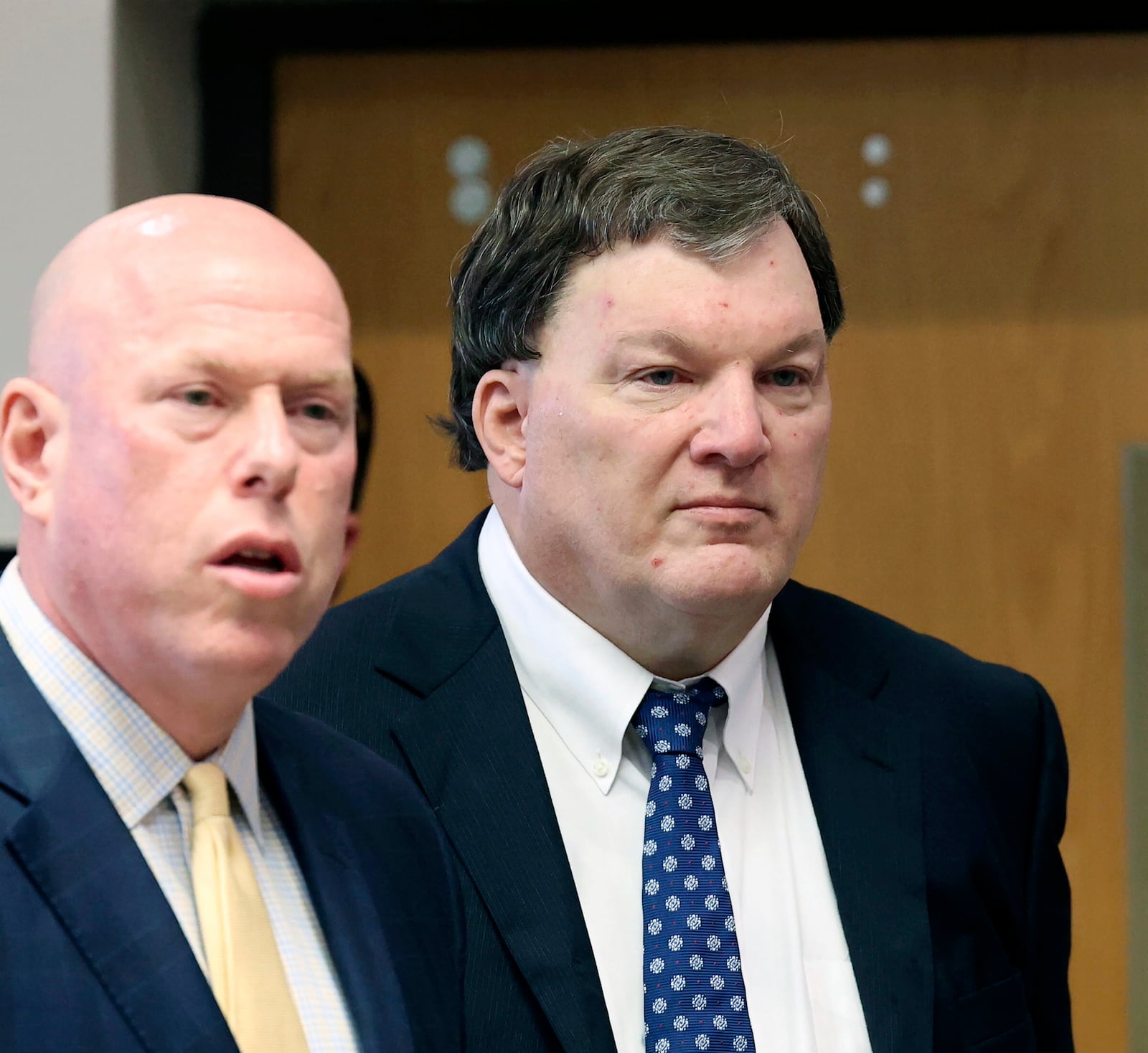 Rex A. Heuermann stands with with his lawyer Michael Brown during a court hearing where he was charged with killing Valerie Mack, inside Supreme Court Justice Timothy Mazzei's courtroom at Suffolk County Court in Riverhead, N.Y. on Tuesday, Dec. 17, 2024. (James Carbone/Newsday via AP, Pool)