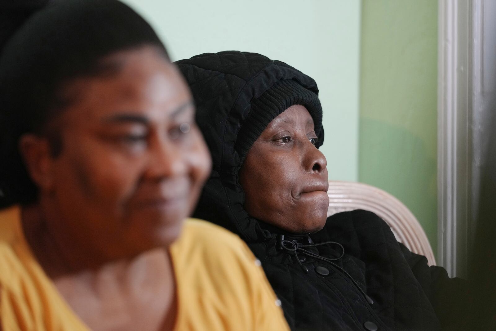 Rosette Etienne, pauses as she talks about the refugees she has sponsored with the help of the Erzule Paul Foundation, Thursday, Jan. 23, 2025, in North Miami, Fla. (AP Photo/Marta Lavandier)