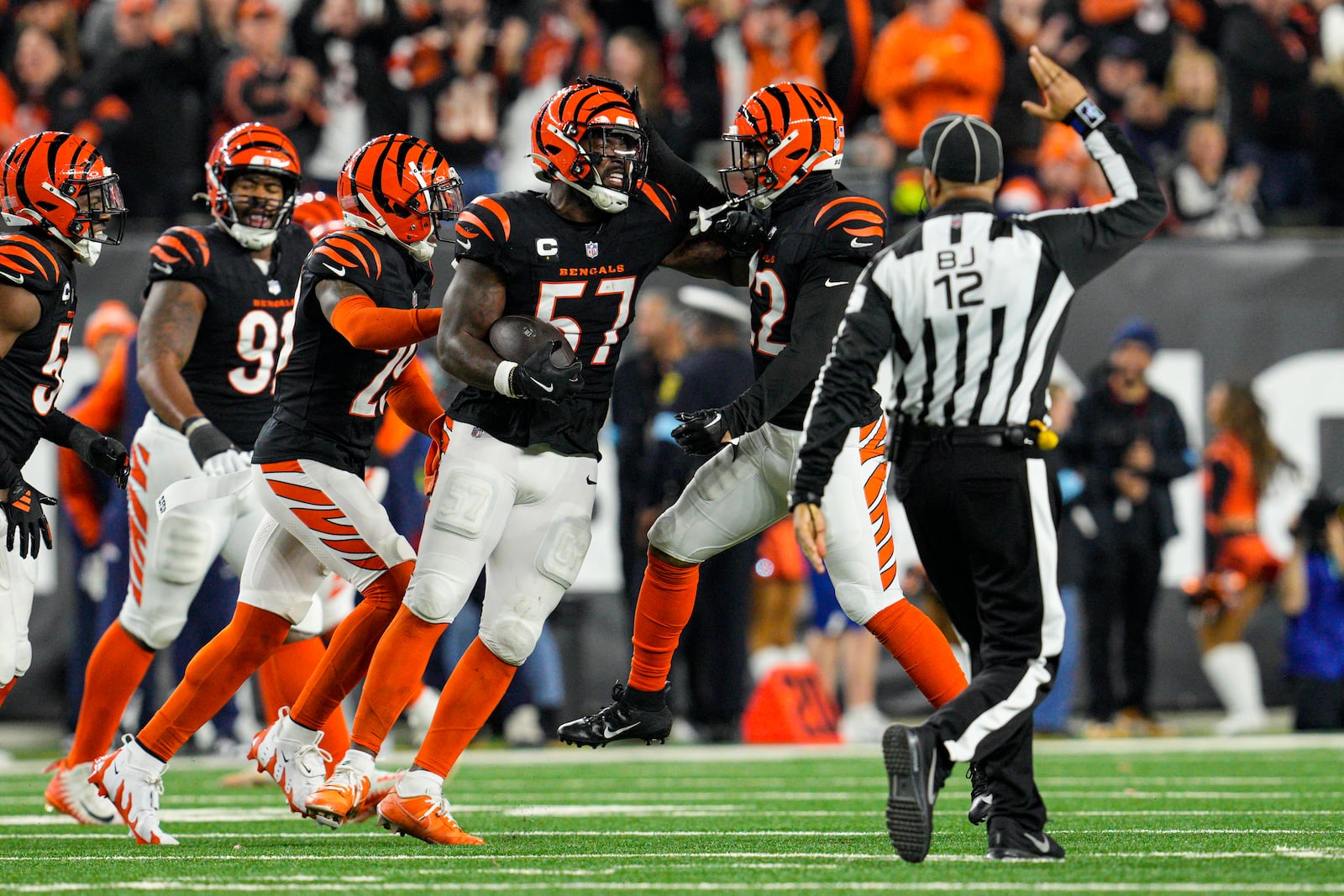 Cincinnati Bengals linebacker Germaine Pratt (57) celebrates an interception against the Denver Broncos during the second half of an NFL football game in Cincinnati, Saturday, Dec. 28, 2024. (AP Photo/Jeff Dean)