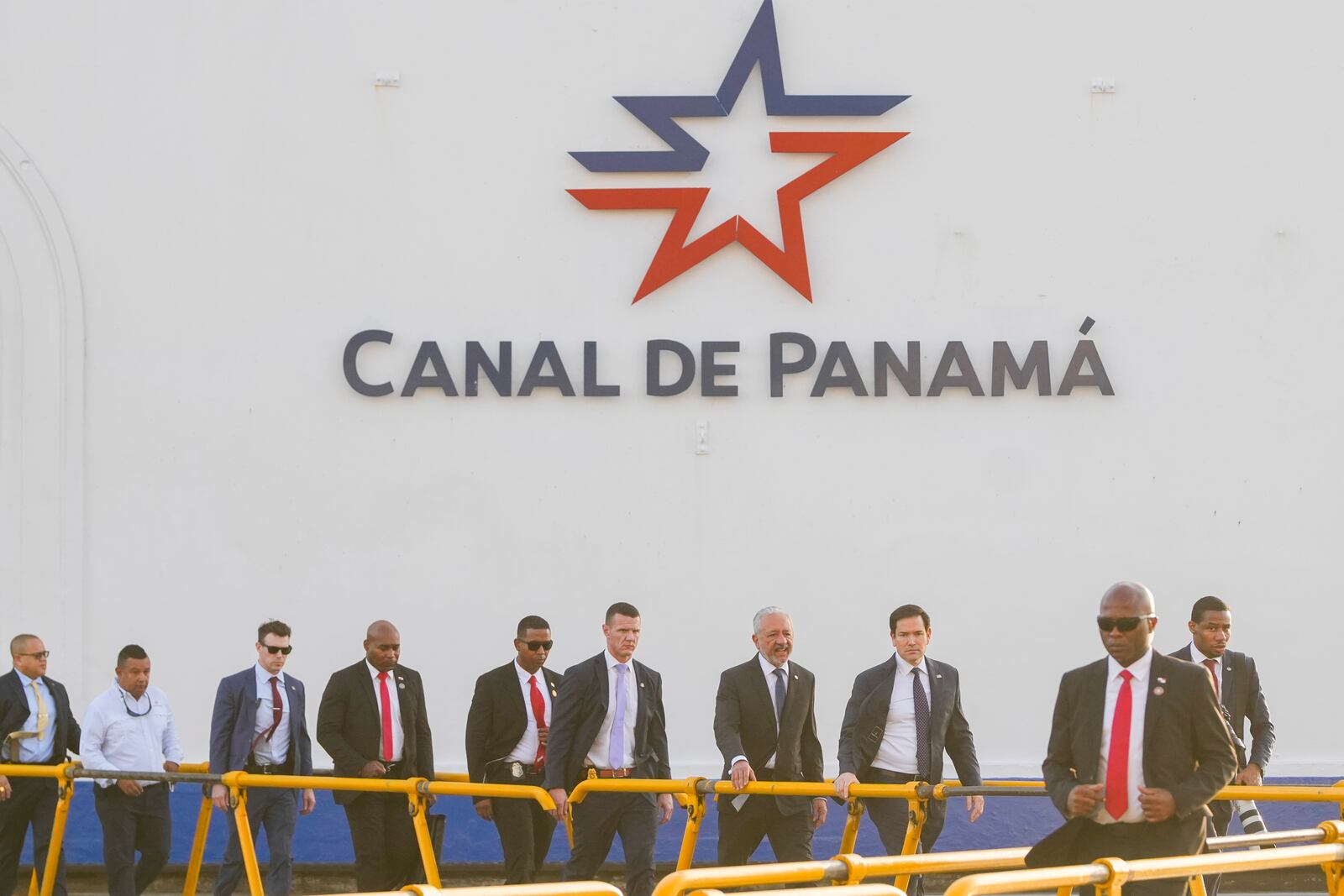 U.S. Secretary of State Marco Rubio, third from right, tours the Miraflores locks at the Panama Canal in Panama City, Sunday, Feb. 2, 2025. (AP Photo/Mark Schiefelbein, Pool)