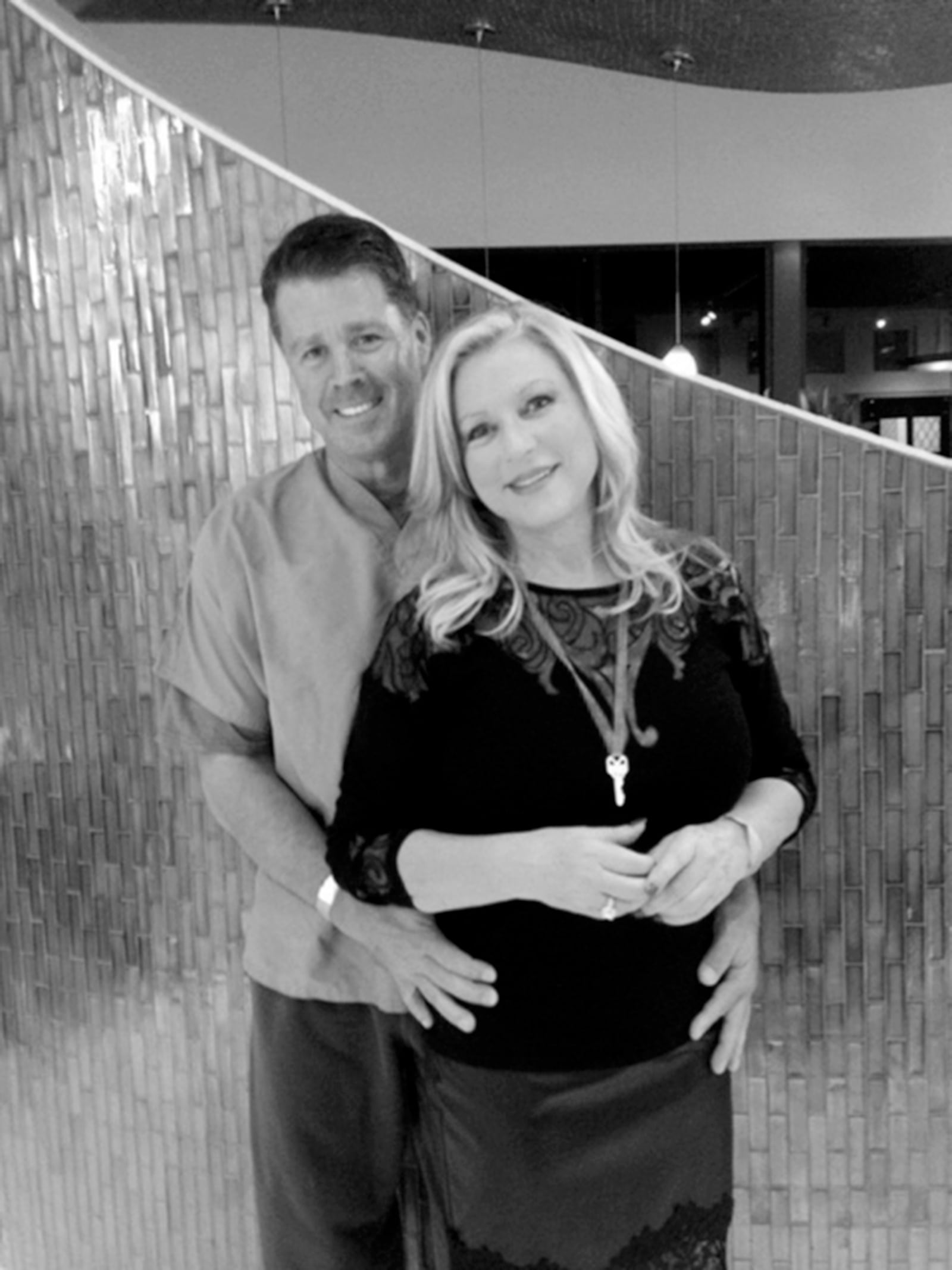 Debra Newell and John Meehan attend a formal event in Orange County, Calif. John arrives in his faded blue medical scrubs to the formal-dress cancer benefit. (TNS)