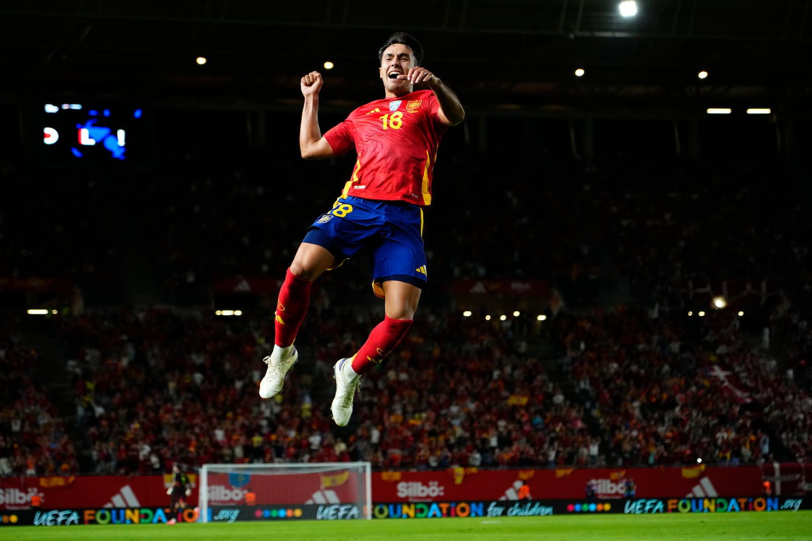 Spain's Martín Zubimendi celebrates after scoring the opening goal during the UEFA Nations League group 4 soccer match between Spain and Denmark in Murcia, Spain, Saturday, Oct. 12, 2024. (AP Photo/Jose Breton)