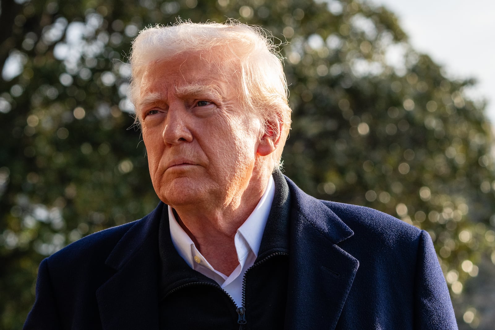 
                        President Donald Trump speaks to reporters as he departs the White House on Friday morning, Jan. 24, 2025. The Office of Personnel Management sought to entice civilian federal employees to resign, as Trump seeks to reshape the government. (Eric Lee/The New York Times)
                      