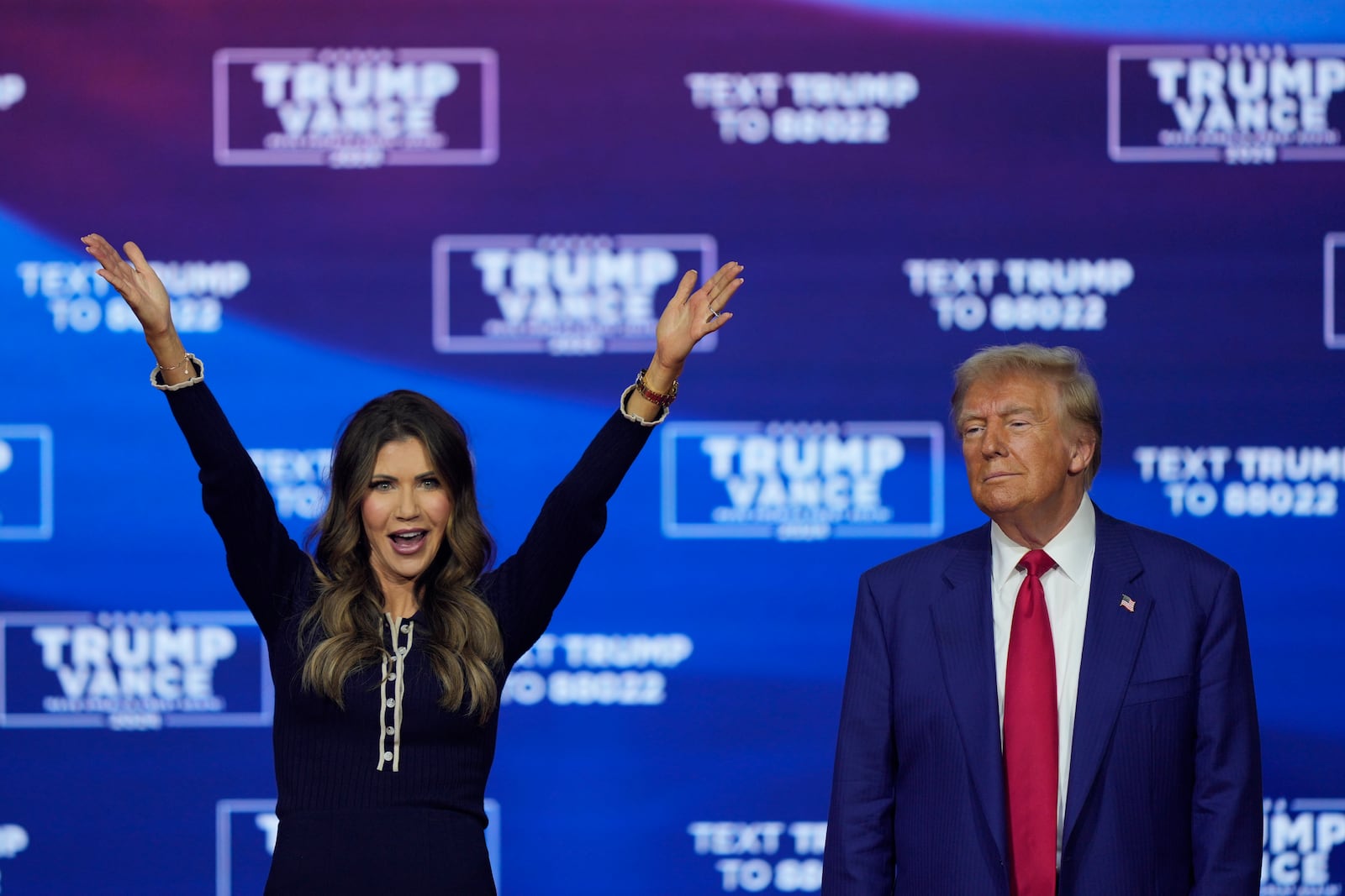 FILE - Republican presidential nominee former President Donald Trump and South Dakota Gov. Kristi Noem dance to the song "Y.M.C.A." at a campaign town hall at the Greater Philadelphia Expo Center & Fairgrounds, Oct. 14, 2024, in Oaks, Pa. (AP Photo/Matt Rourke, File)