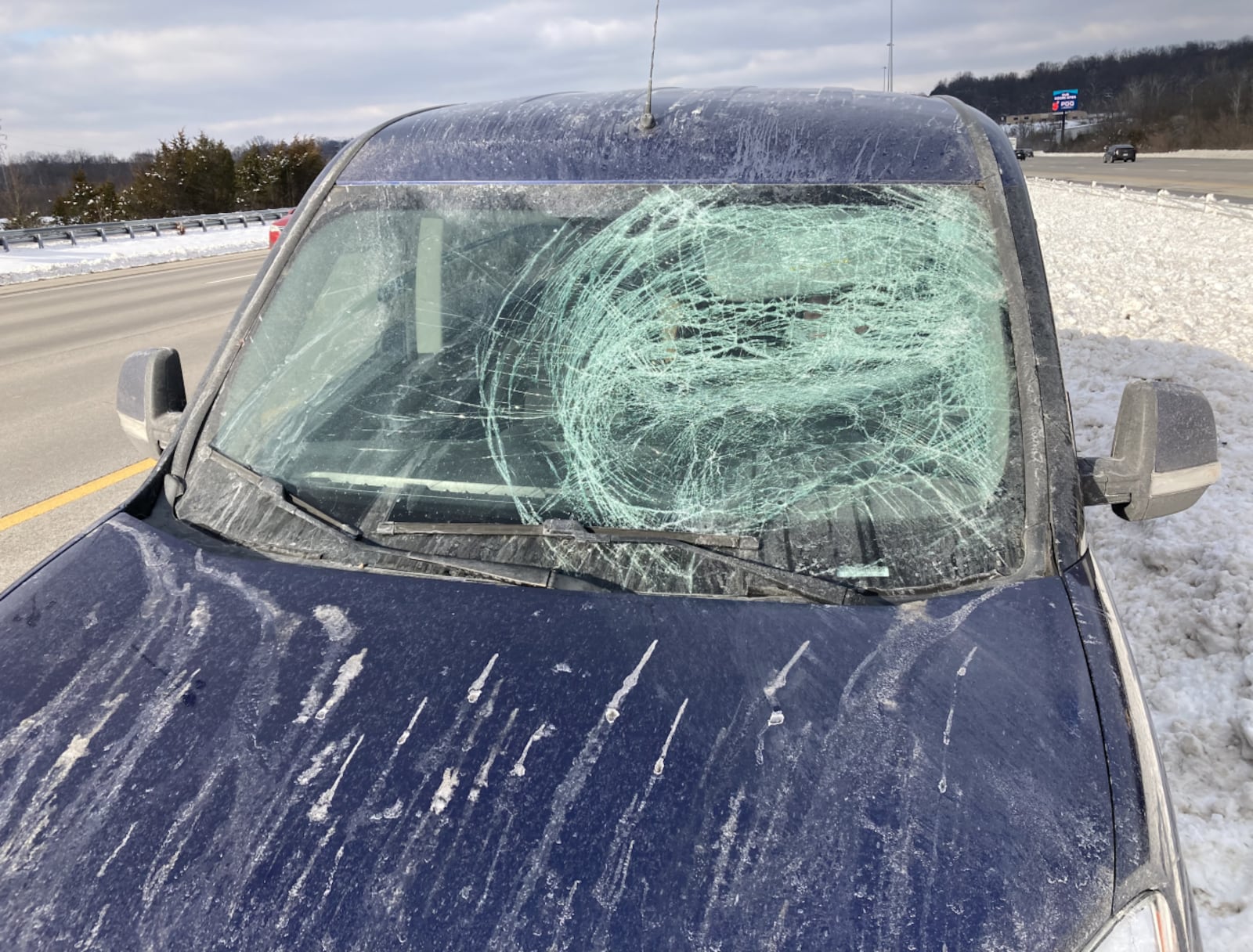 Car windshield smashed by ice falling off a semi. LT.SCOTT KUNTZ/CONTRIBUTED/WCPO