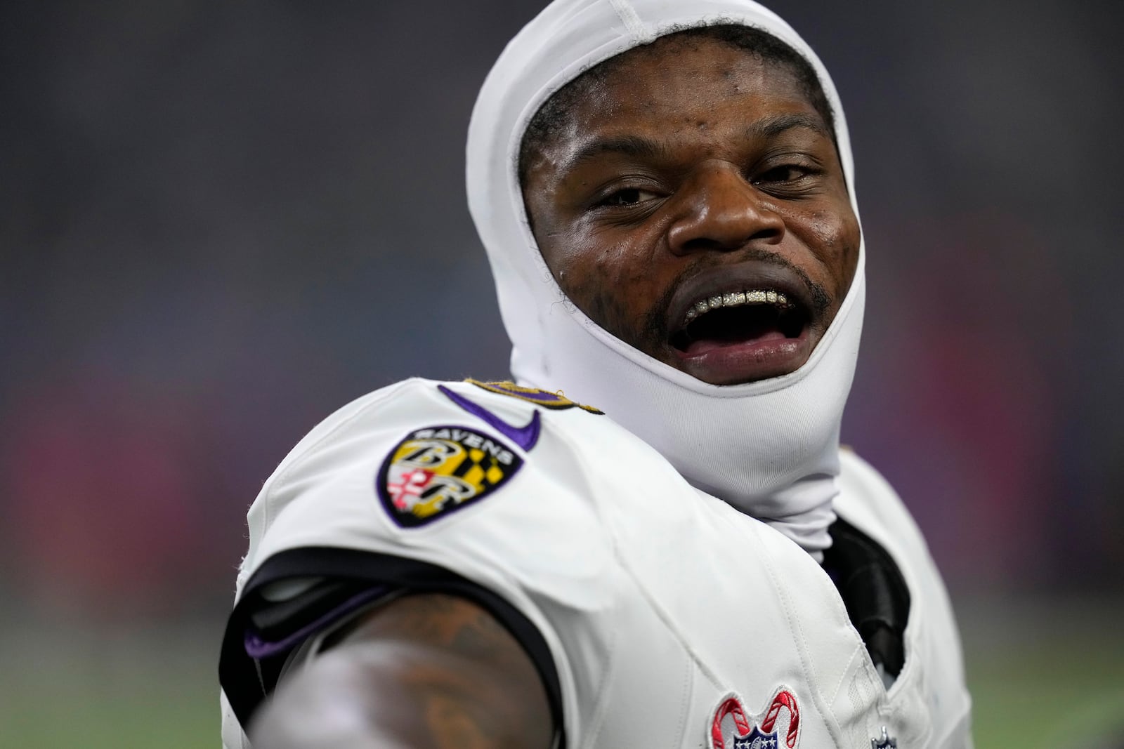 Baltimore Ravens quarterback Lamar Jackson reacts on the sideline during the second half of an NFL football game against the Houston Texans, Wednesday, Dec. 25, 2024, in Houston. (AP Photo/David J. Phillip)