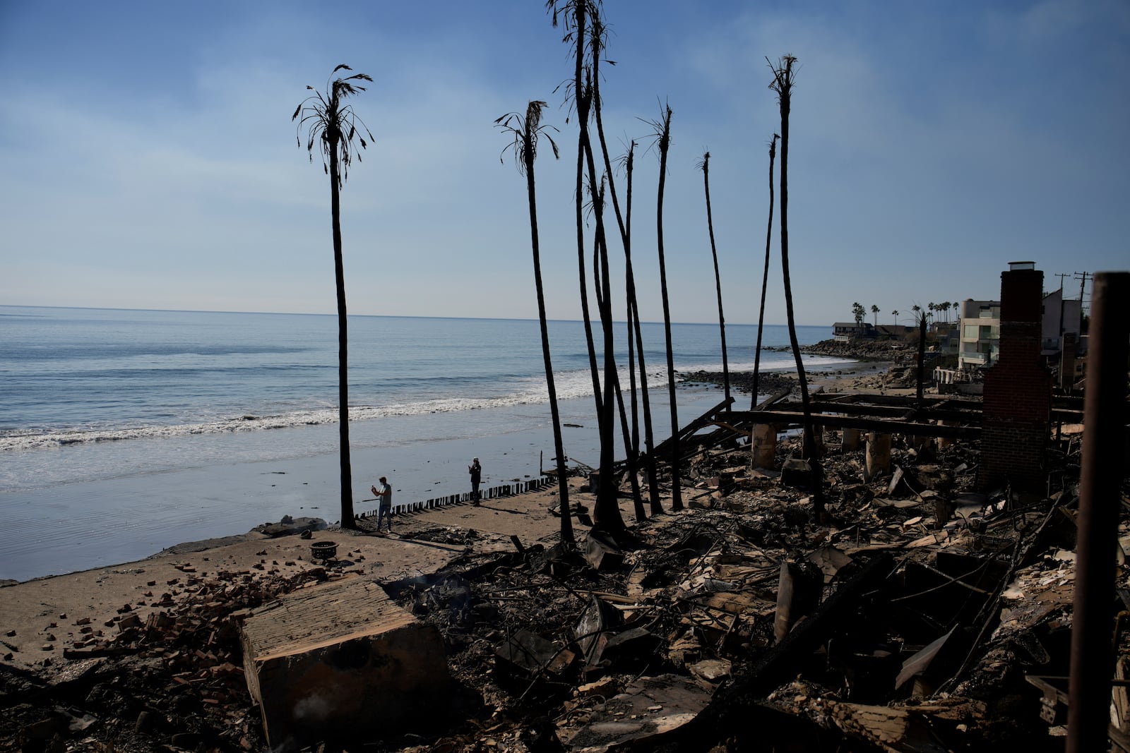 FILE - Beachfront properties are burned to the ground by the Palisades Fire on Friday, Jan. 10, 2025, in Malibu, Calif. (AP Photo/John Locher)